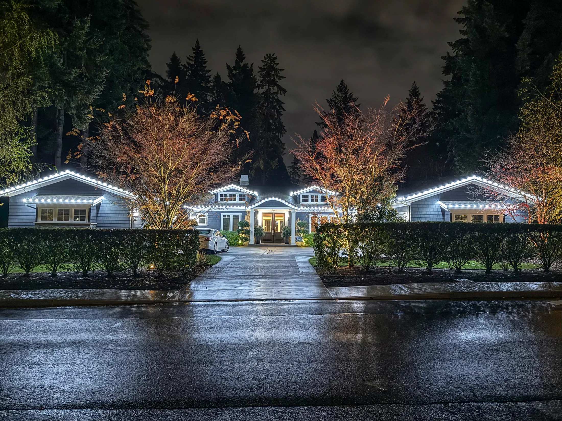 Residential Christmas light installation 2 by Premium Holiday Lights in Salem, OR, warm commercial-grade C9 LED roofline lighting at night