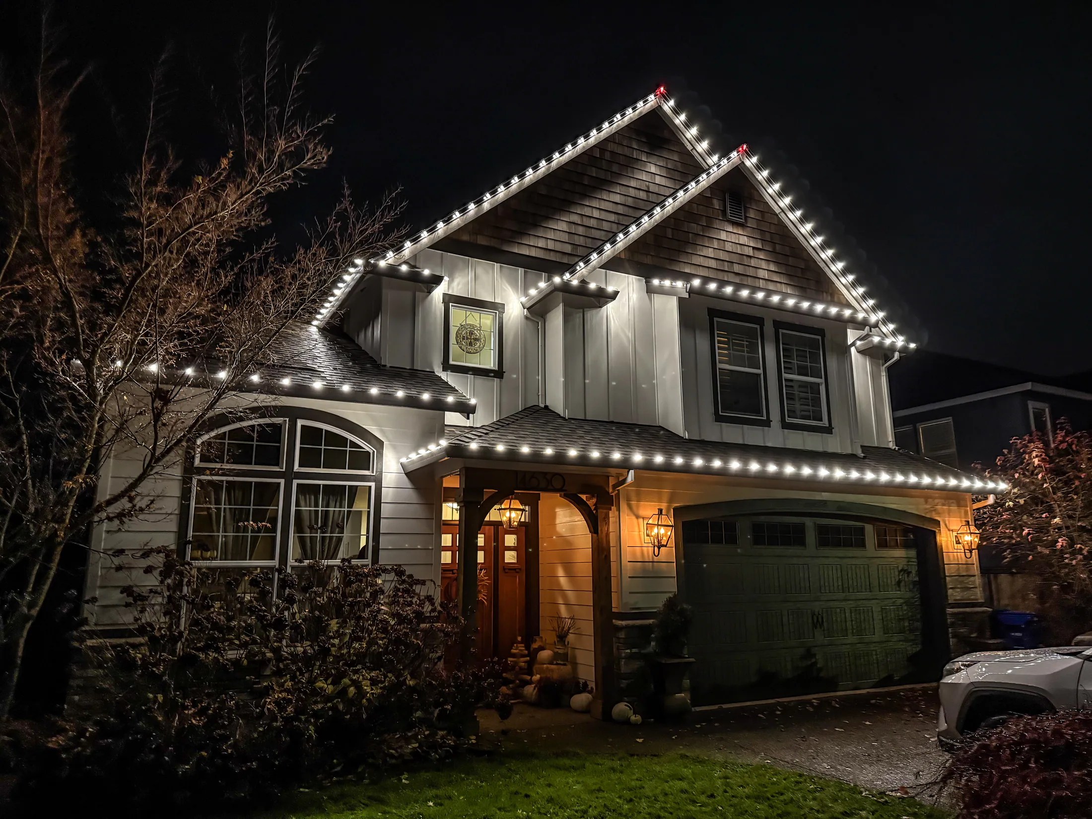 Residential Christmas light installation 5 by Premium Holiday Lights in Salem, OR, warm commercial-grade C9 LED roofline lighting at night