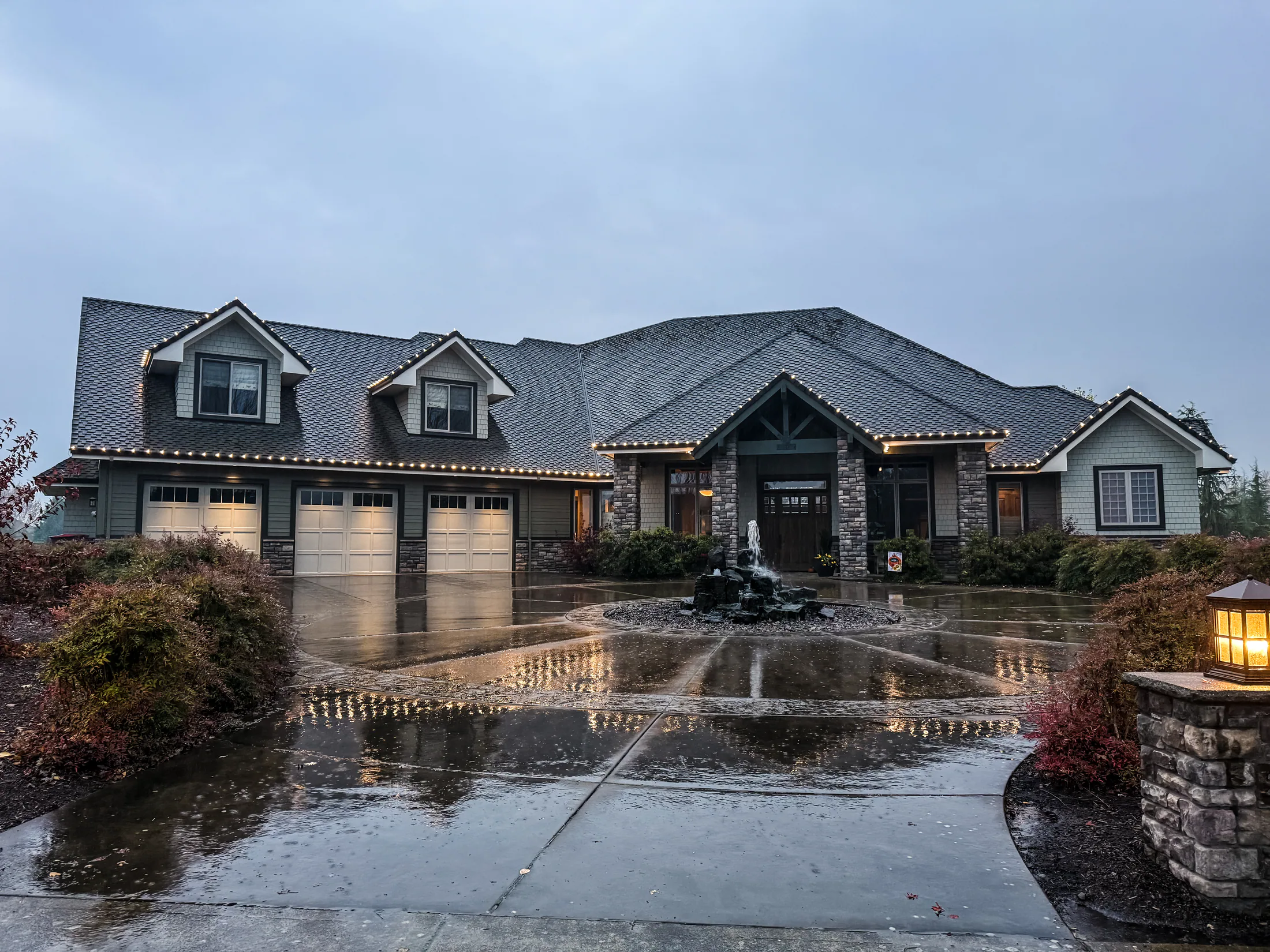 Residential Christmas light installation 3 by Premium Holiday Lights in Salem, OR, warm commercial-grade C9 LED roofline lighting at night