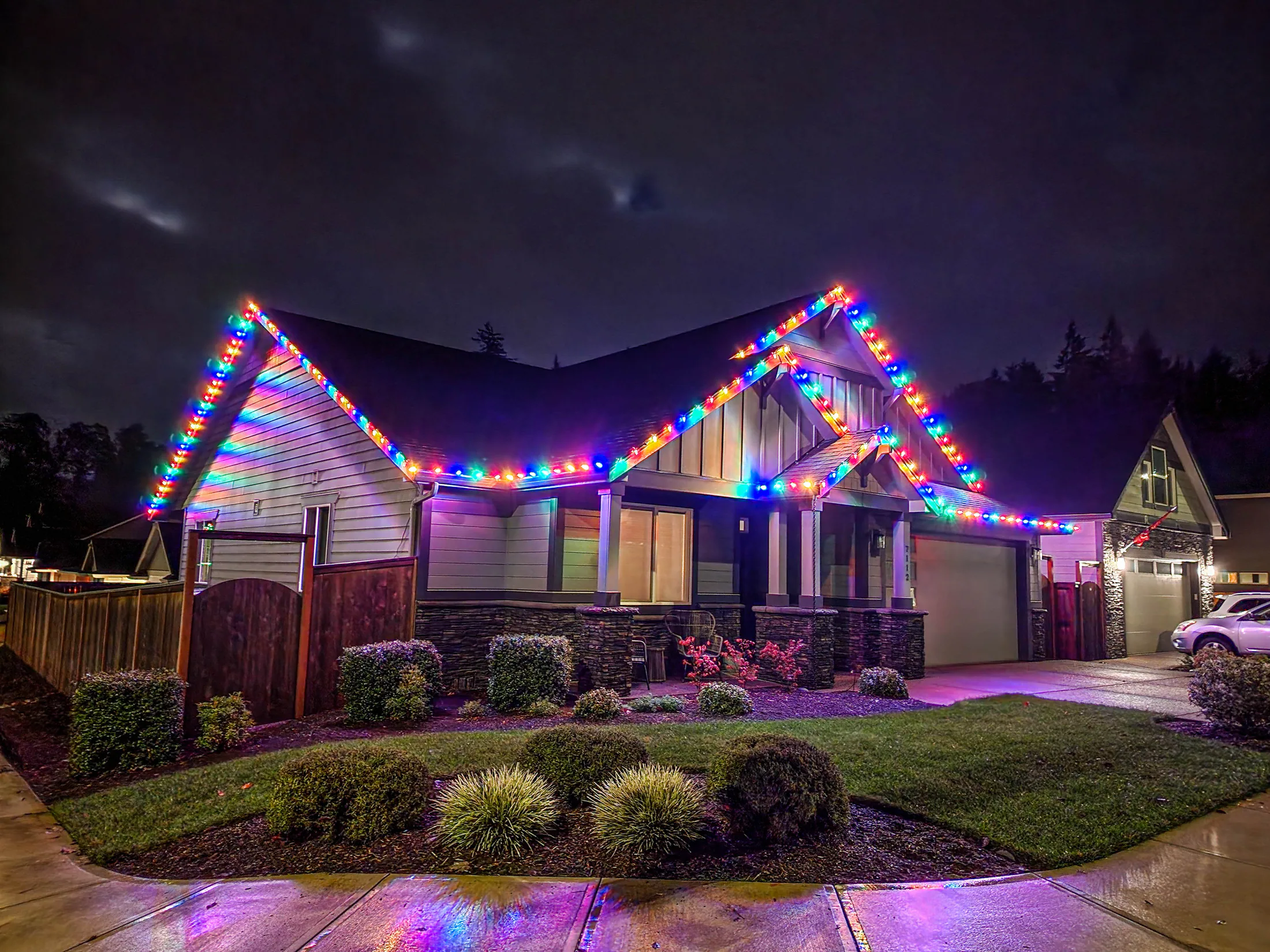 Residential Christmas light installation 11 by Premium Holiday Lights in Salem, OR, warm commercial-grade C9 LED roofline lighting at night