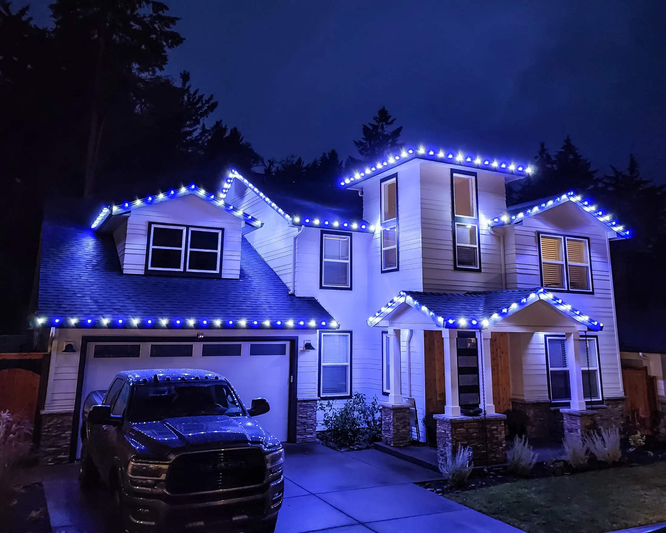 Residential Christmas light installation 7 by Premium Holiday Lights in Salem, OR, warm commercial-grade C9 LED roofline lighting at night