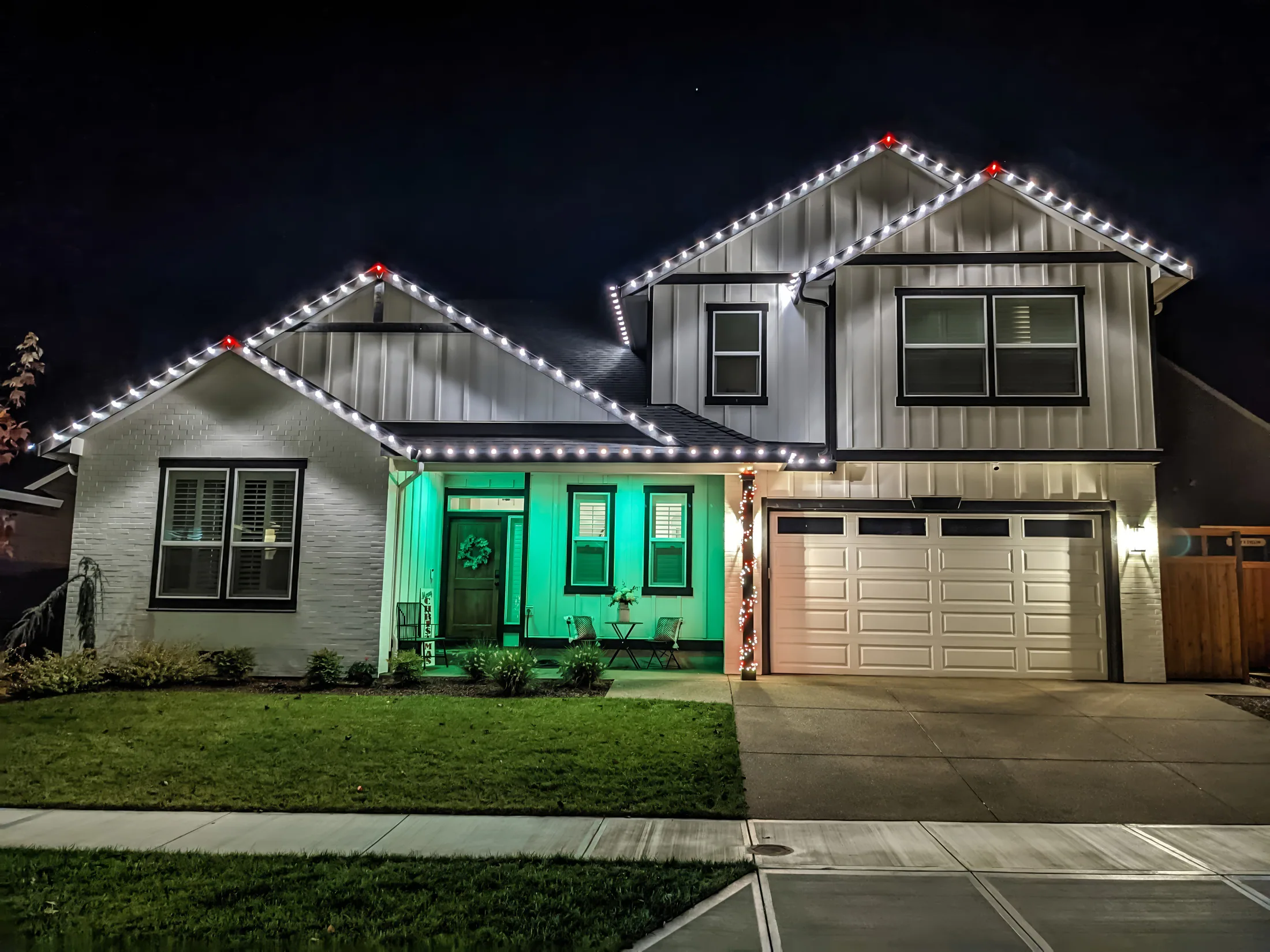 Residential Christmas light installation 12 by Premium Holiday Lights in Salem, OR, warm commercial-grade C9 LED roofline lighting at night