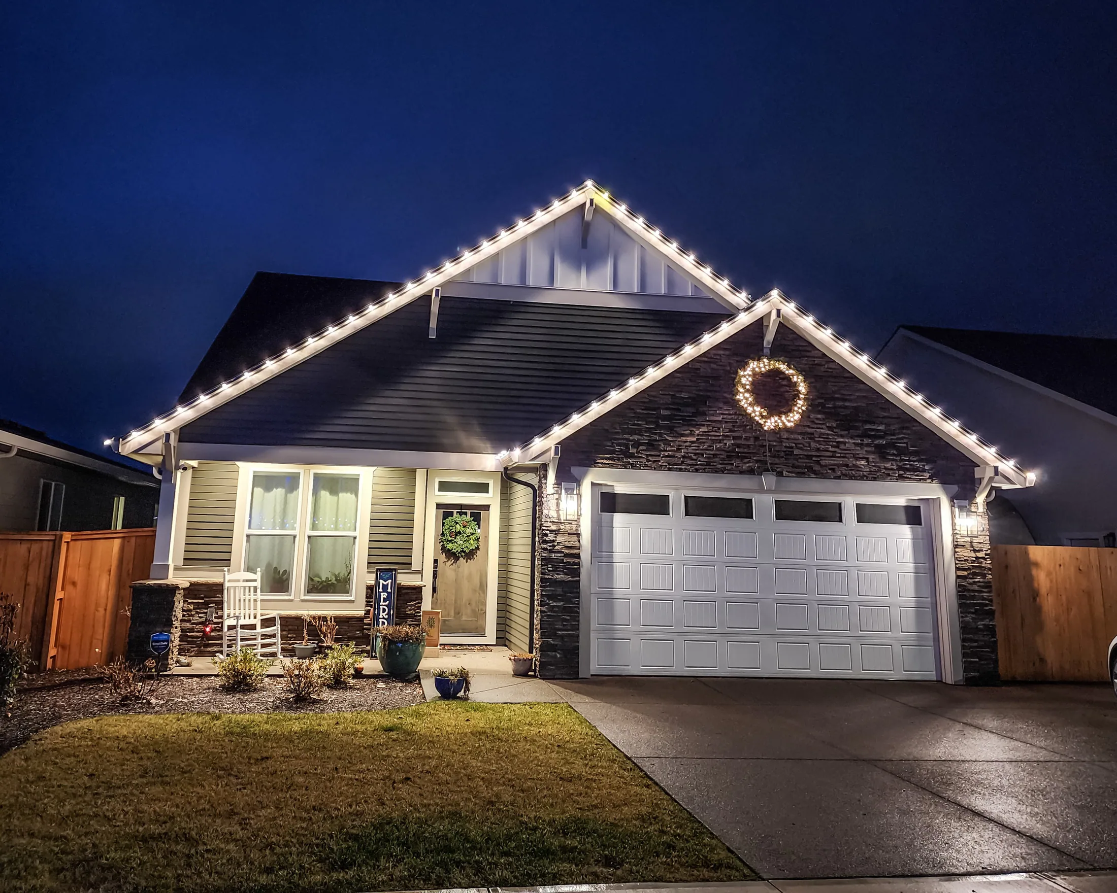Residential Christmas light installation 15 by Premium Holiday Lights in Salem, OR, warm commercial-grade C9 LED roofline lighting at night