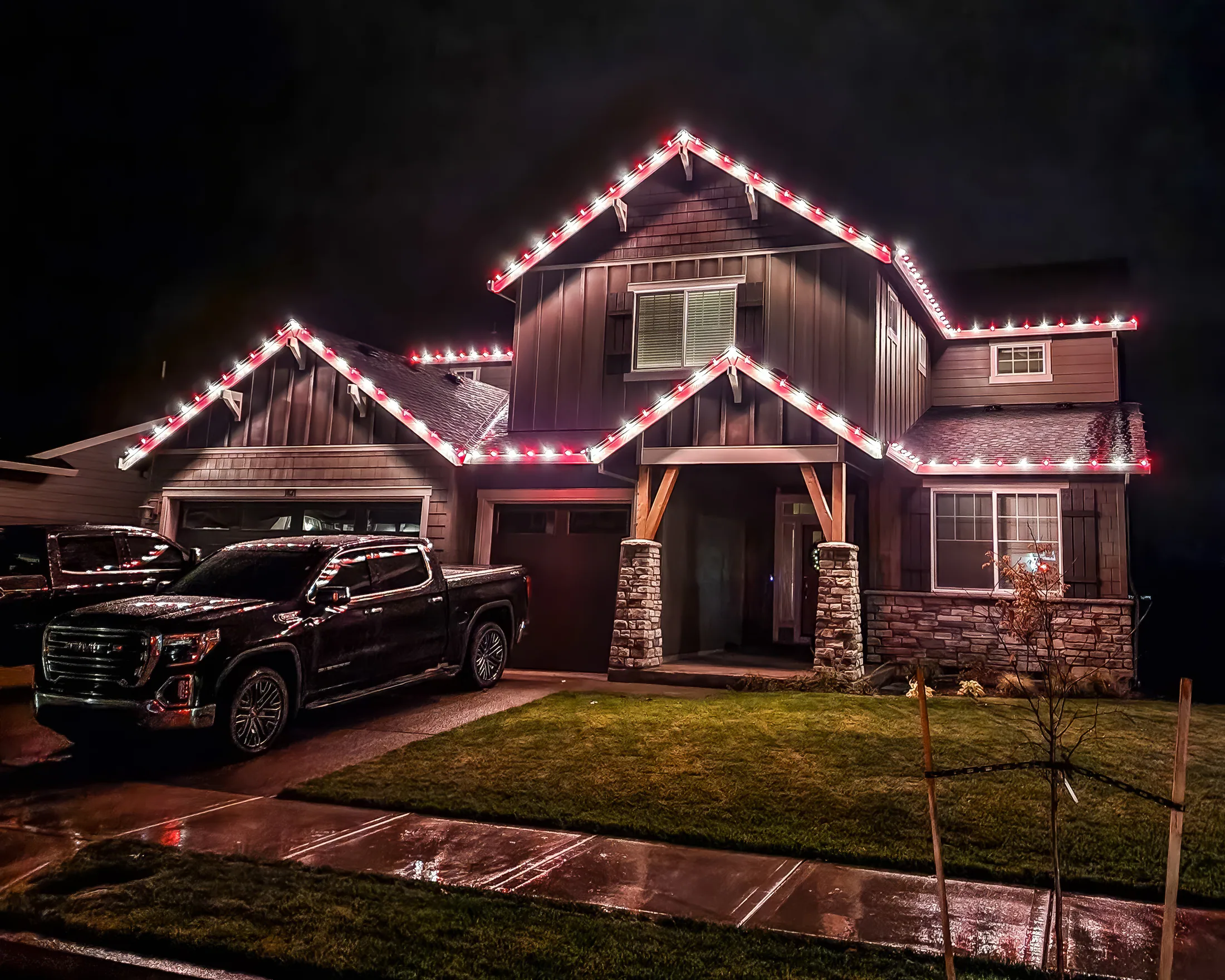 Residential Christmas light installation 16 by Premium Holiday Lights in Salem, OR, warm commercial-grade C9 LED roofline lighting at night