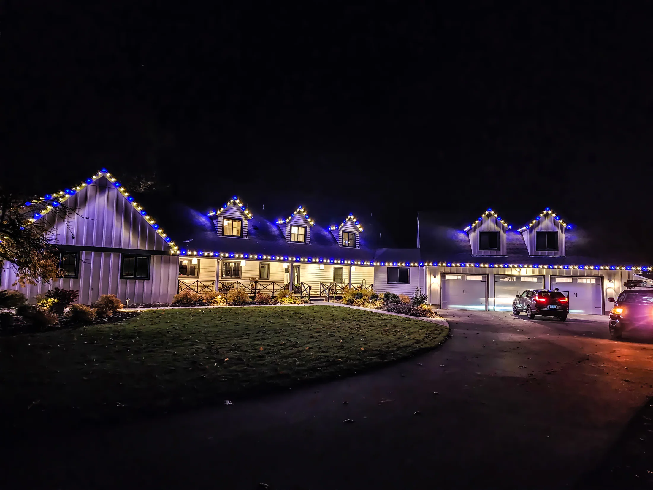 Residential Christmas light installation 19 by Premium Holiday Lights in Salem, OR, warm commercial-grade C9 LED roofline lighting at night