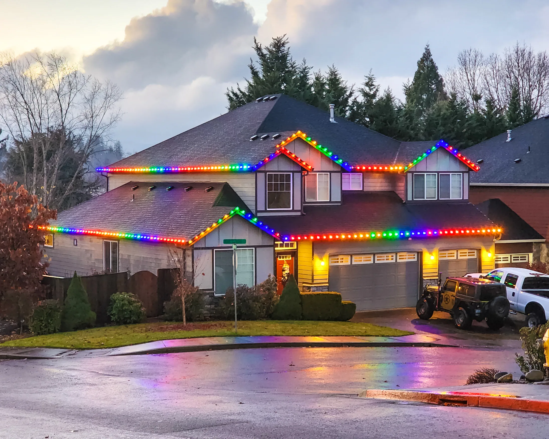 Residential Christmas light installation 27 by Premium Holiday Lights in Salem, OR, warm commercial-grade C9 LED roofline lighting at night