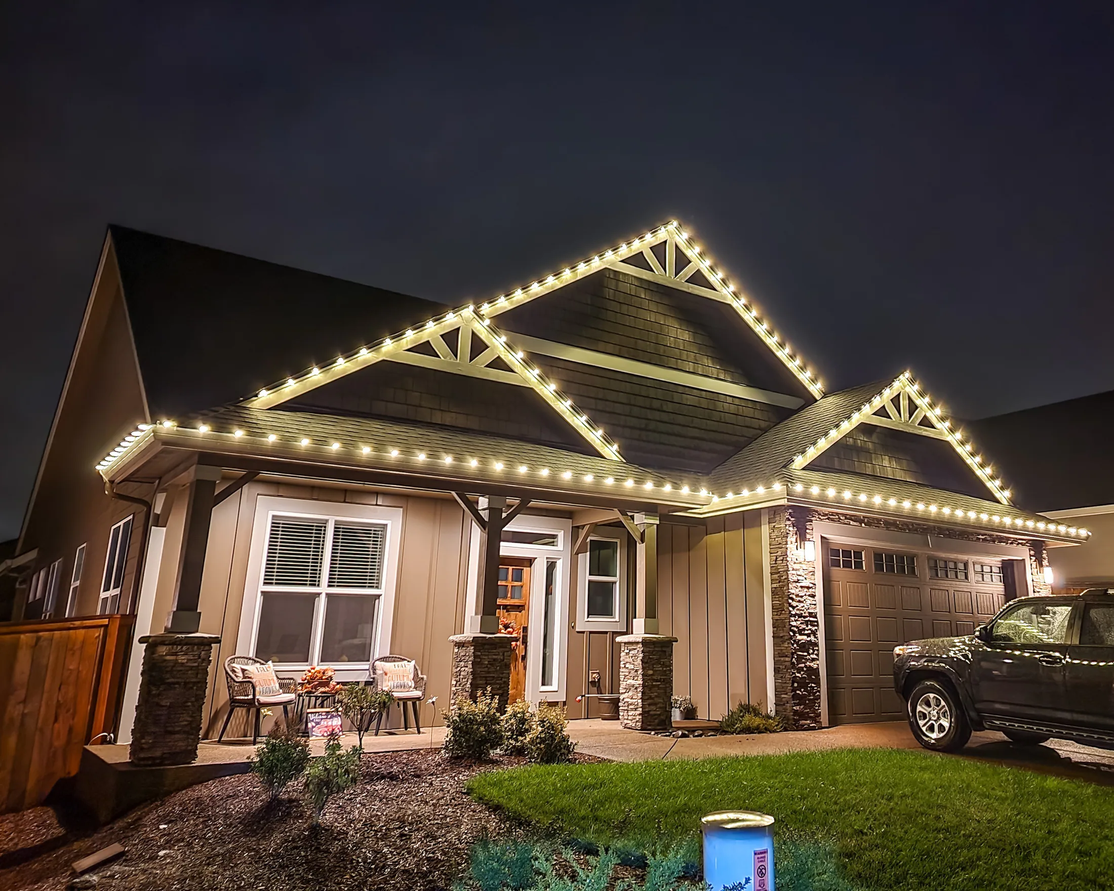 Residential Christmas light installation 26 by Premium Holiday Lights in Salem, OR, warm commercial-grade C9 LED roofline lighting at night