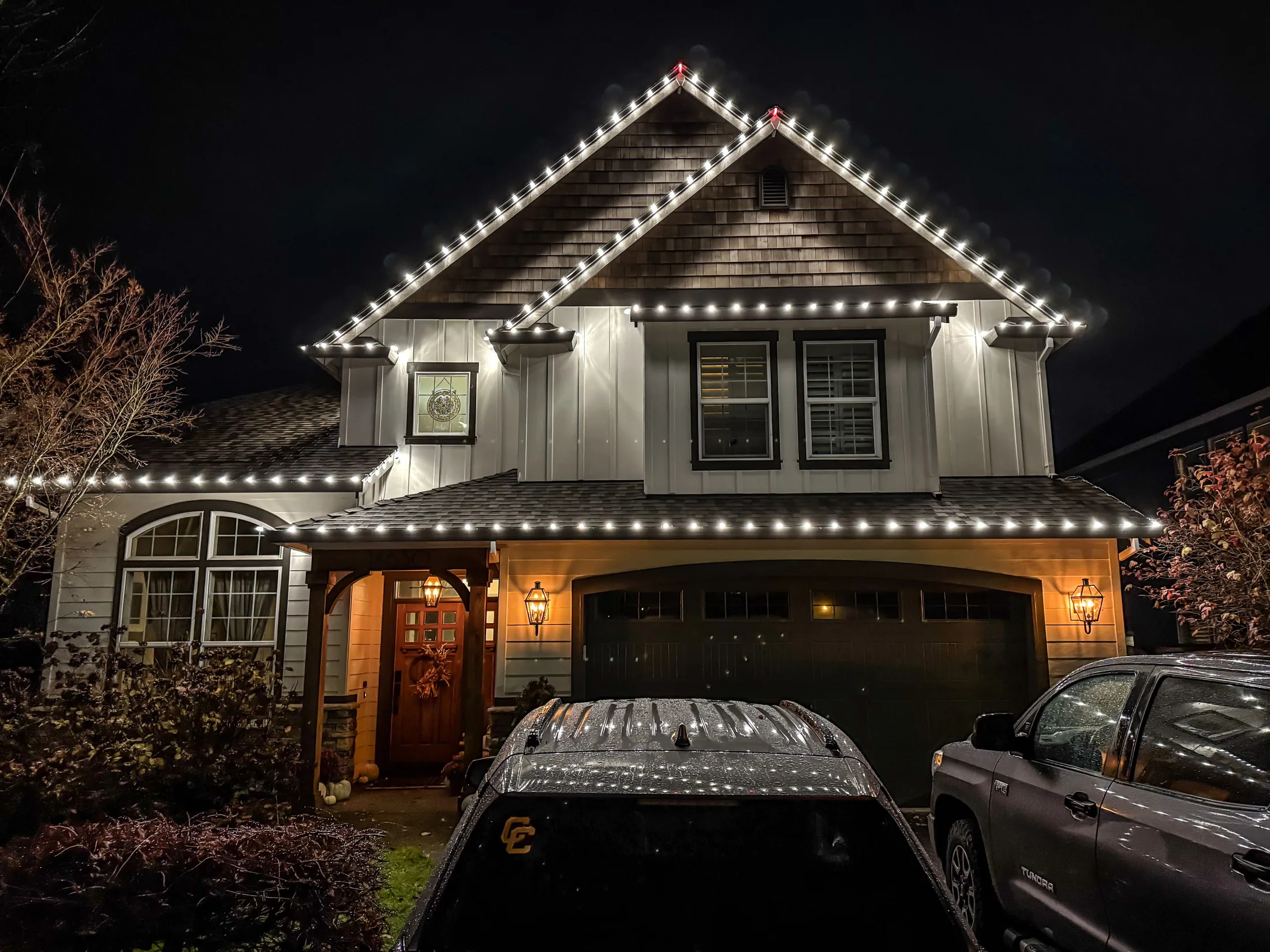 Residential Christmas light installation 33 by Premium Holiday Lights in Salem, OR, warm commercial-grade C9 LED roofline lighting at night