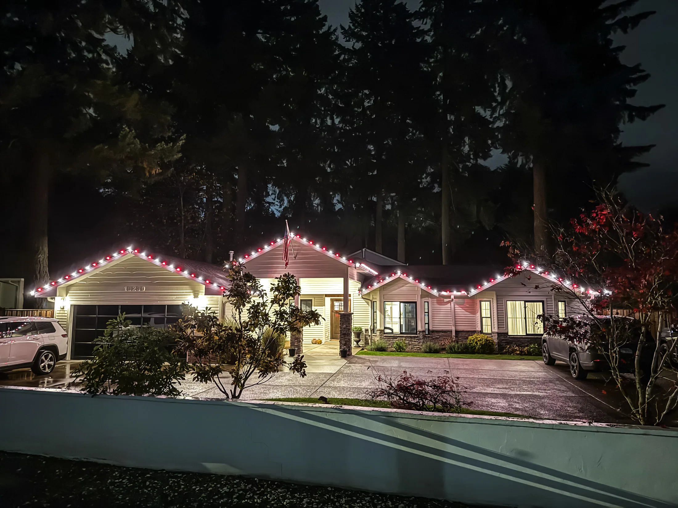 Residential Christmas light installation 38 by Premium Holiday Lights in Salem, OR, warm commercial-grade C9 LED roofline lighting at night