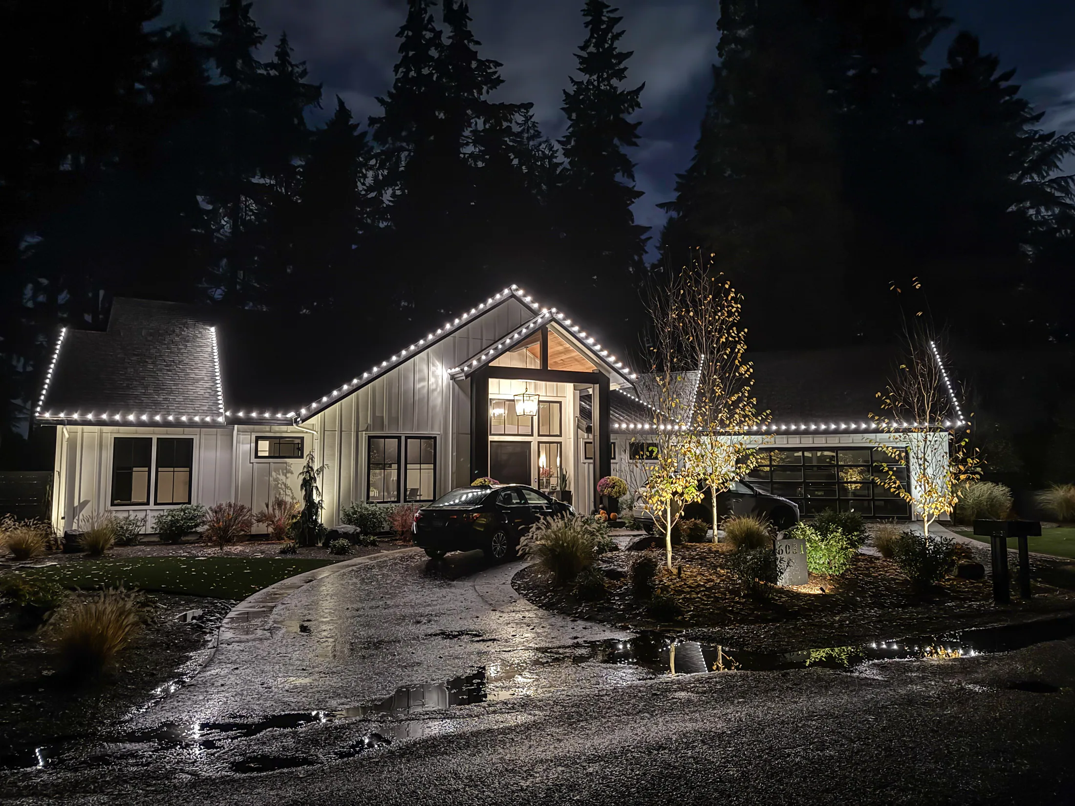 Residential Christmas light installation 32 by Premium Holiday Lights in Salem, OR, warm commercial-grade C9 LED roofline lighting at night