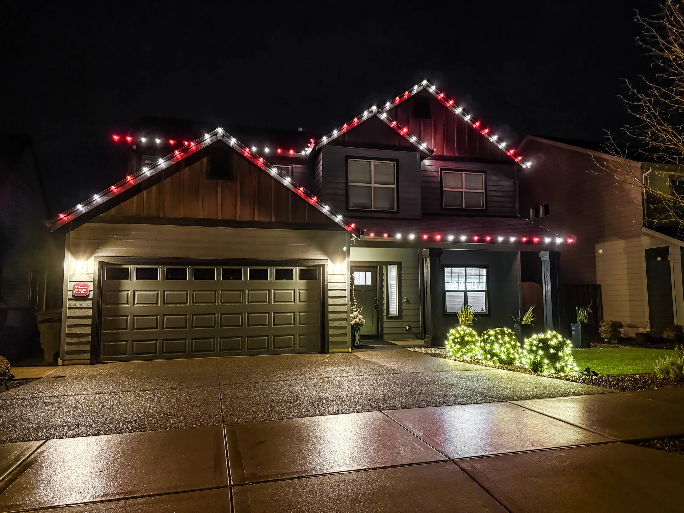 Residential Christmas light installation 44 by Premium Holiday Lights in Salem, OR, warm commercial-grade C9 LED roofline lighting at night