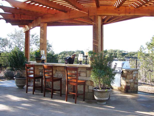 Outdoor kitchen and pergola project completed in Winston-Salem NC by Bollman Landscape