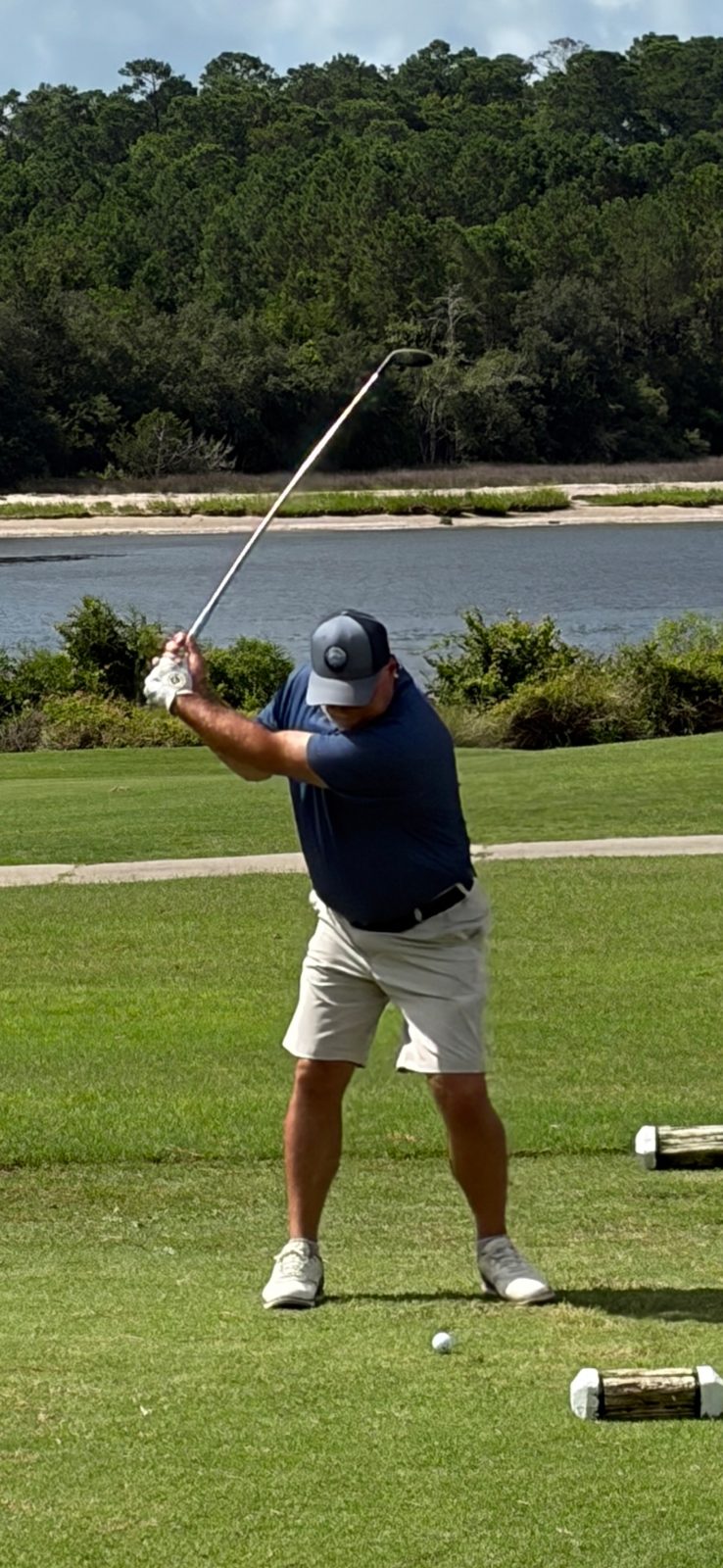 Bill Phaneuf swinging a driver on the course