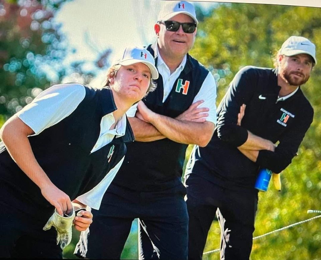 Bill with players on the course