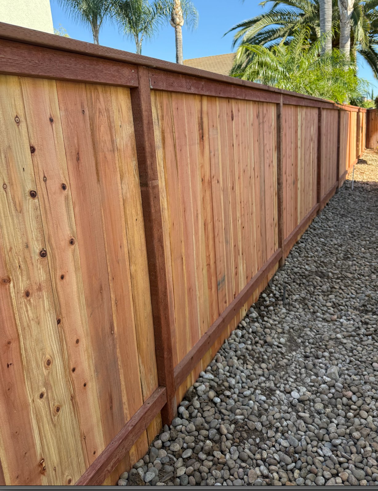 Redwood wood privacy fence installation in Menifee, California