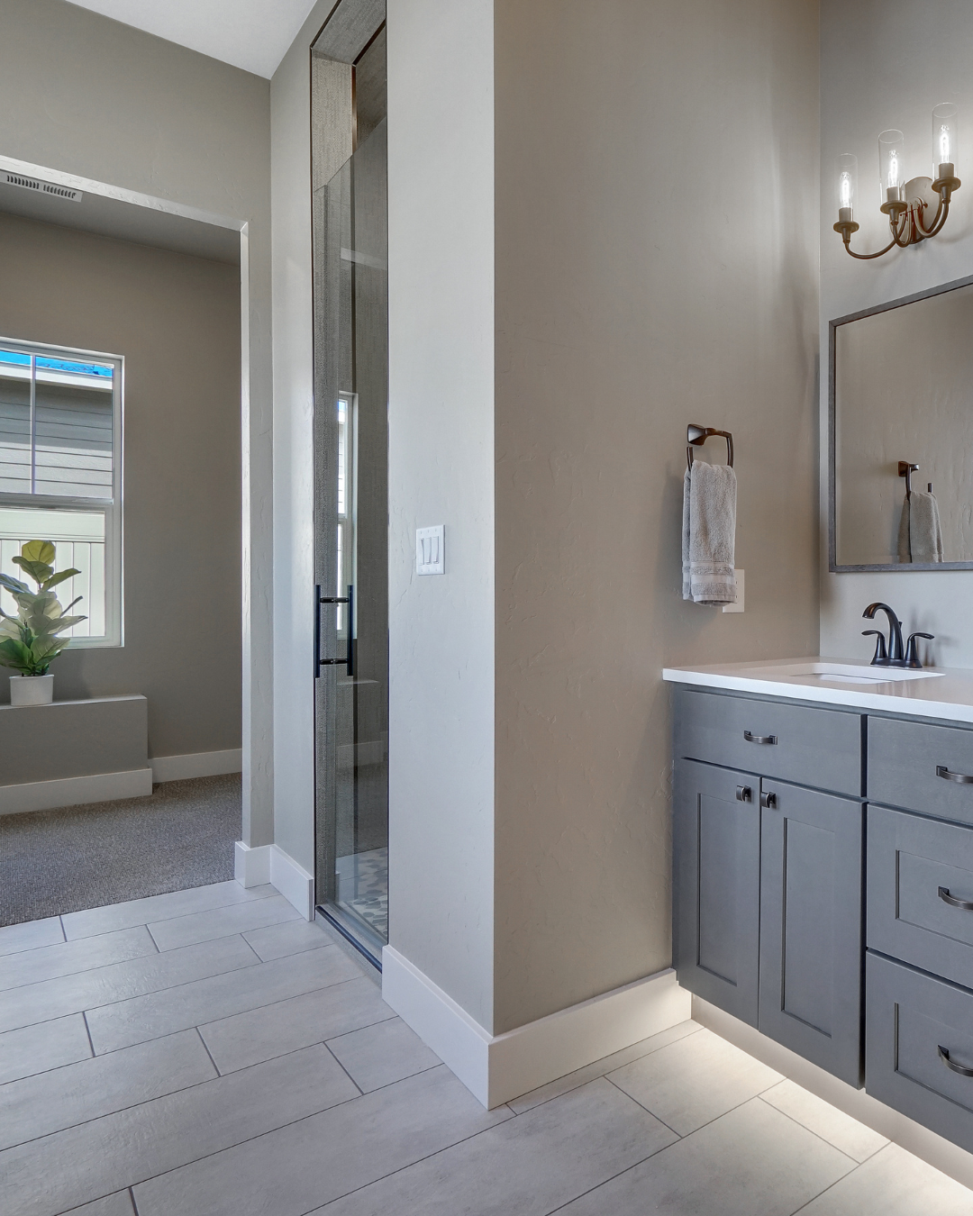 Beautiful modern bathroom remodel in Lake Frederick with glass shower and double vanity