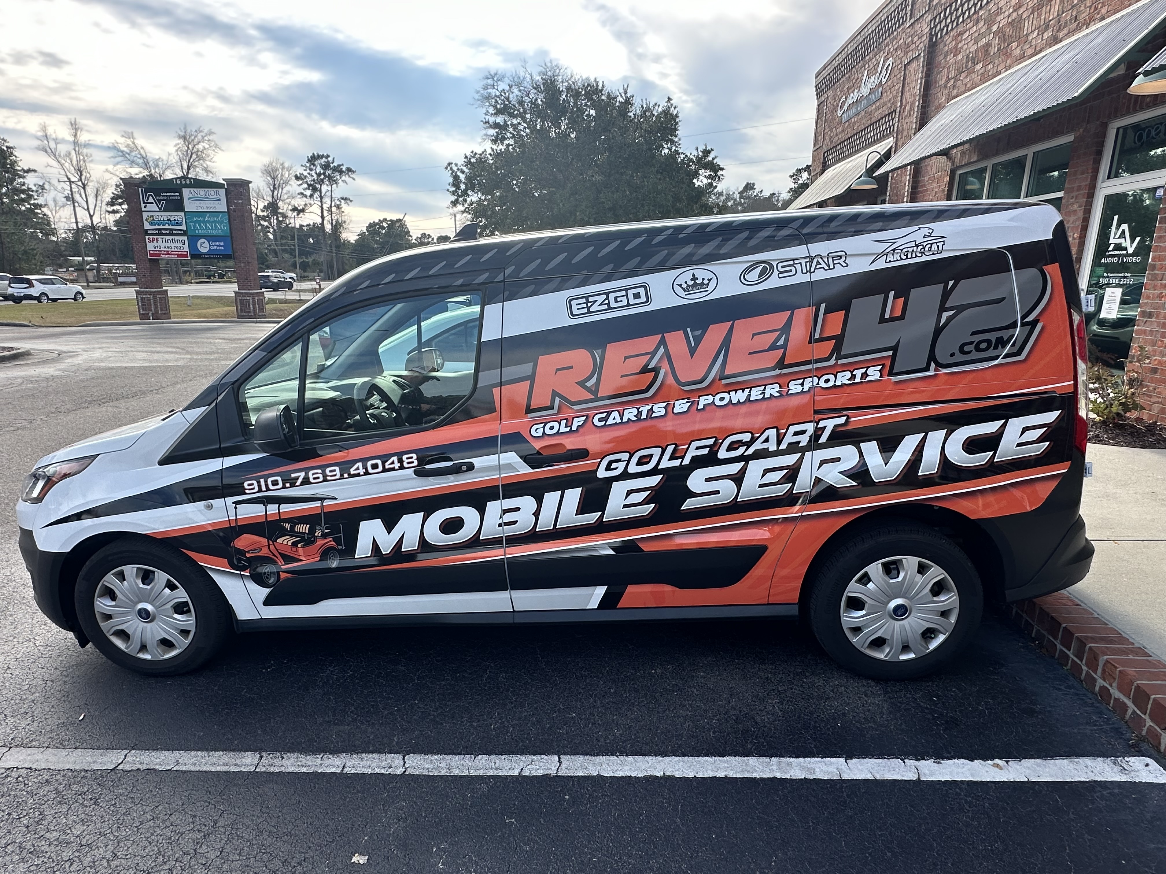 Revel 42 mobile golf cart service van