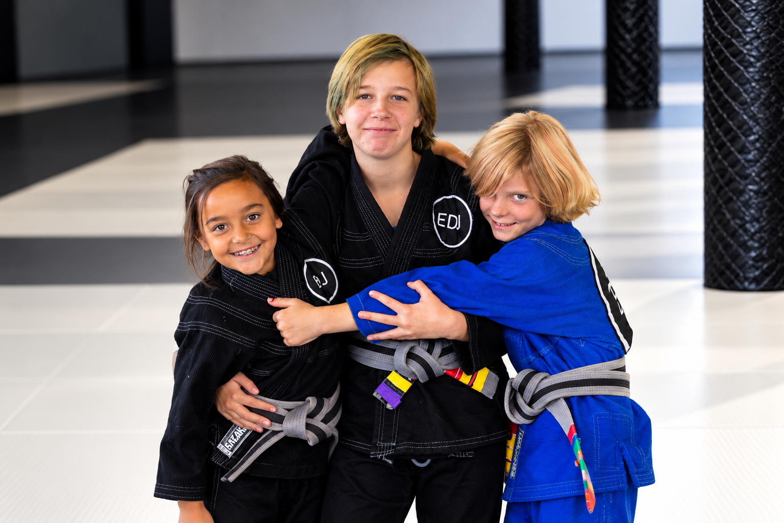 EDJ Riverside happy child in Jiu Jitsu gi