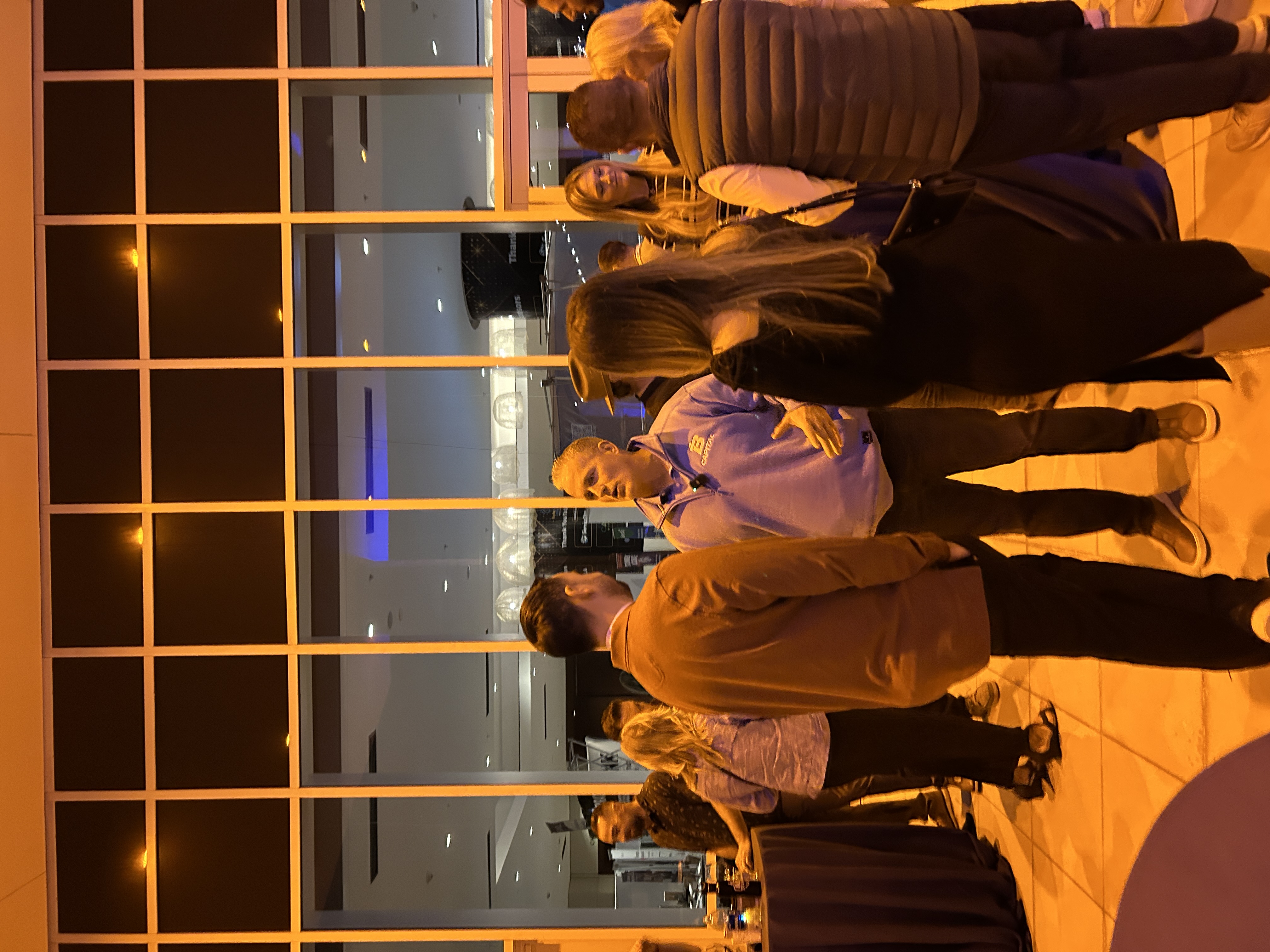 Business owners networking with Lance Bachmann at Build It To Sell It