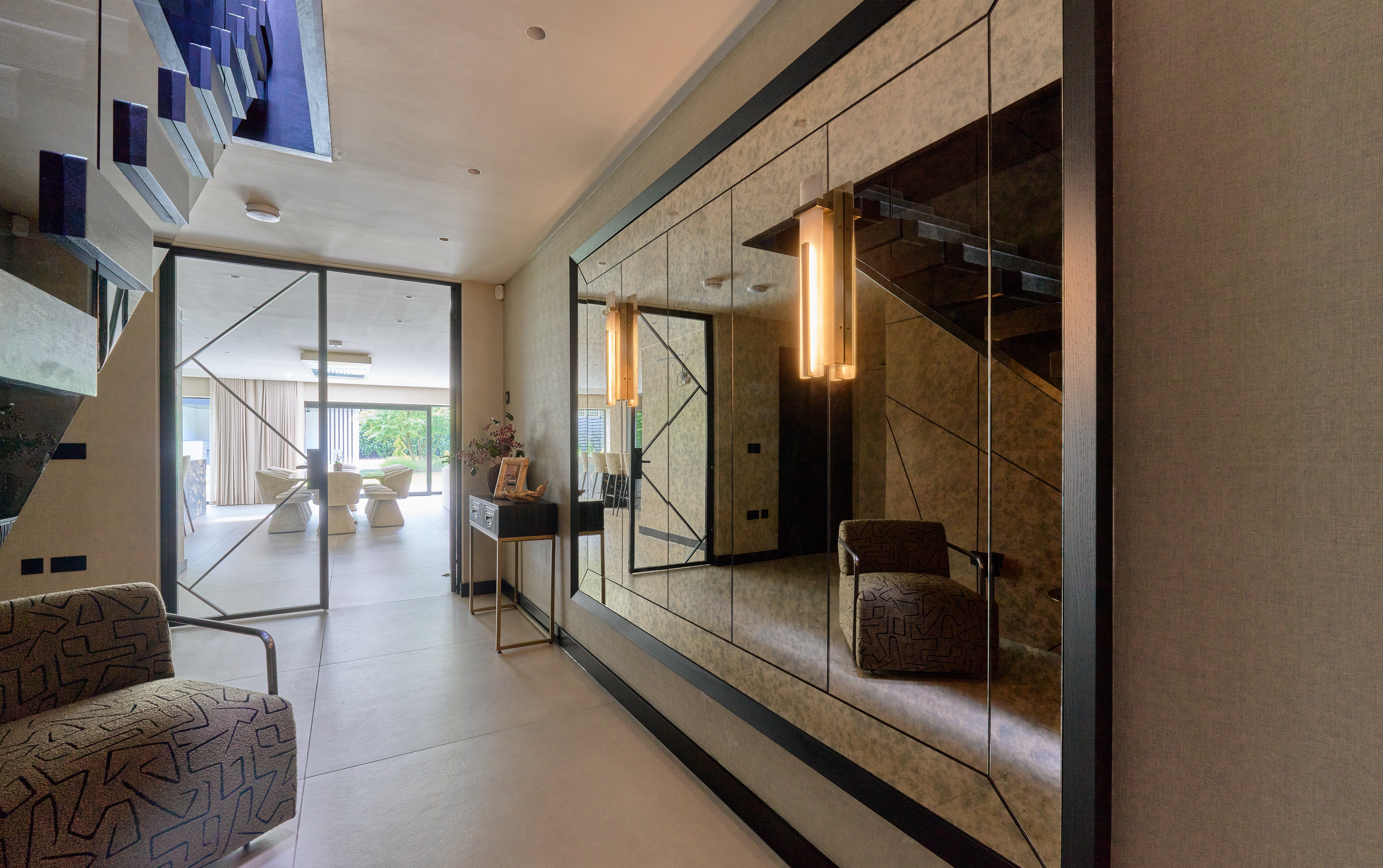 Large antique framed mirror in luxury hallway