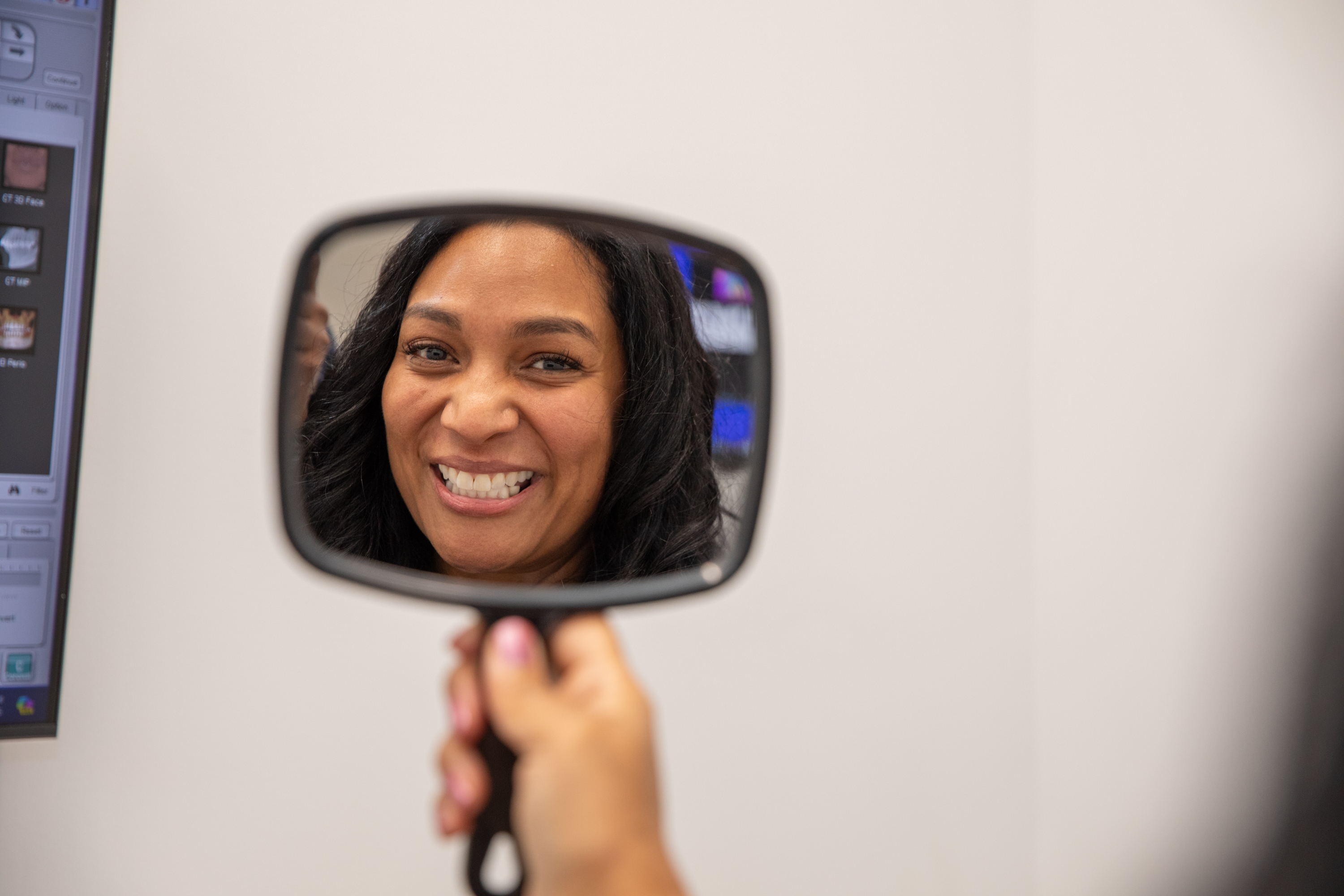 Patient smile after dental implant treatment