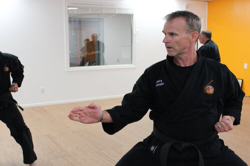 Gary sensei performing a kata in the manotick dojo