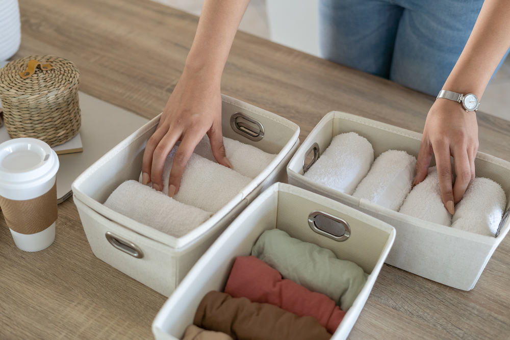 Woman organizing towels
