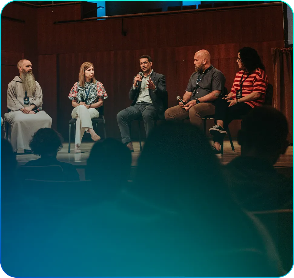 Dr. Greg Bottaro speaking on a panel at a past CatholicPsych Summit