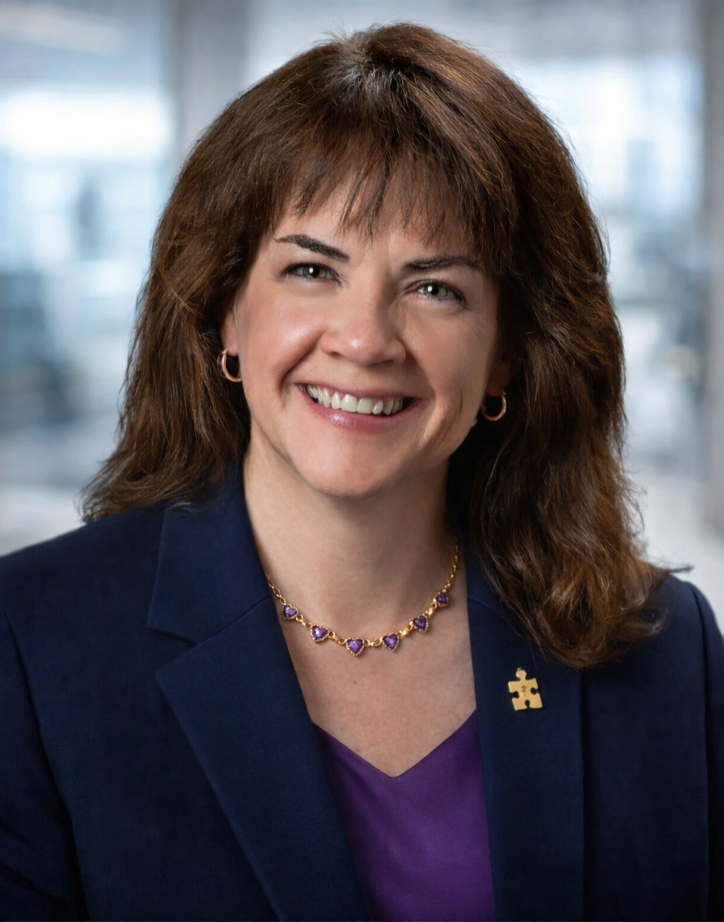 Alice Pallum smiling in a professional portrait