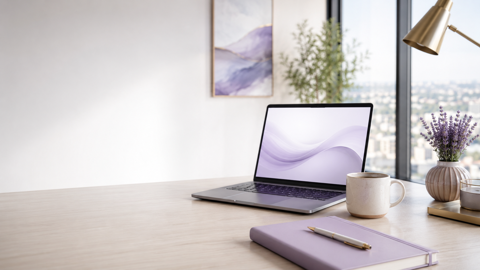 Business planning desk with laptop, notebook, and coffee