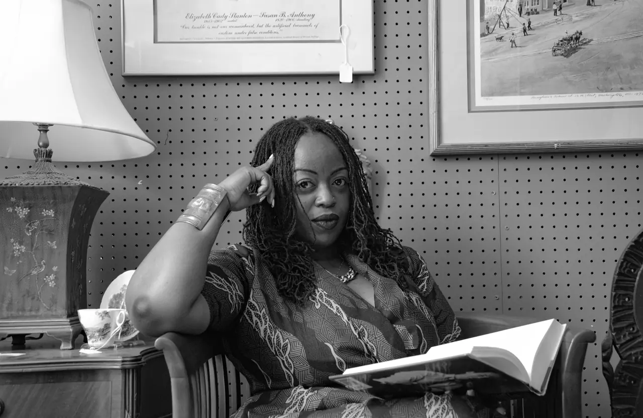 Shnydine, founder of ShaiQueens and creator of ROOTED