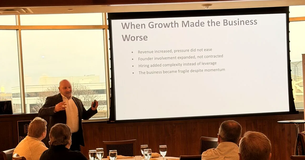 Tom Prokop presenting to a room of business owners