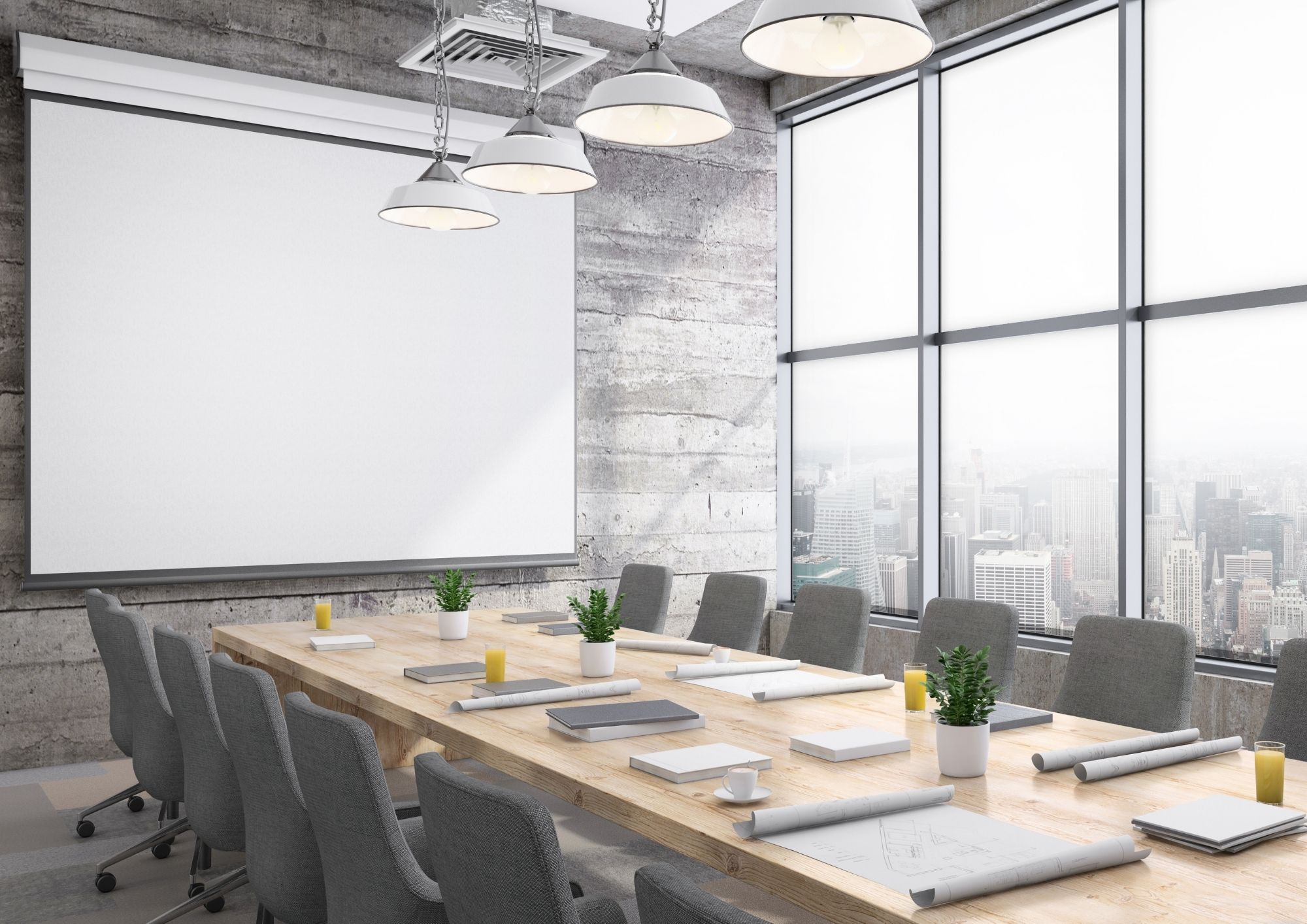 Finished conference room with wall-mounted display and video conferencing system in a Manhattan office