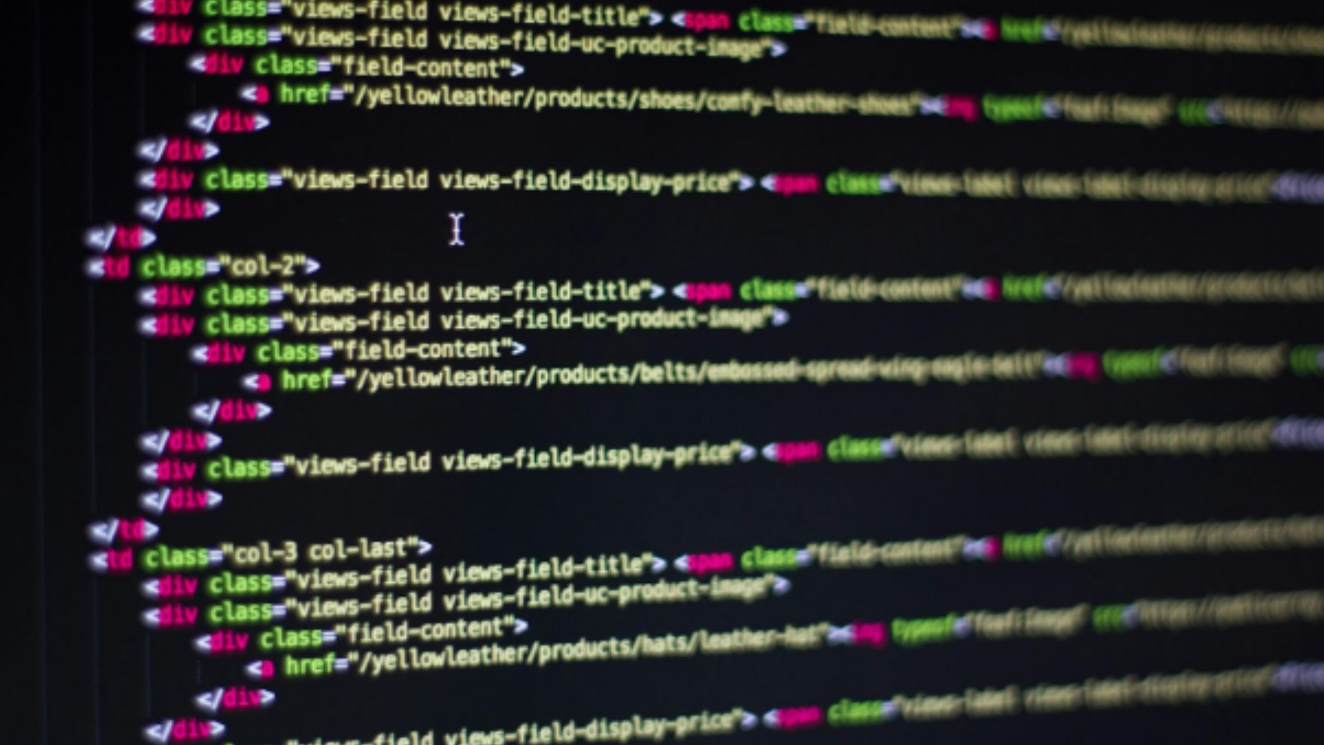Close-up of HTML code on a computer screen, illustrating the technical complexity of coding a custom music website versus using a website builder. Close-up of HTML code on a computer screen, illustrating the technical complexity of coding a custom music website versus using a website builder.