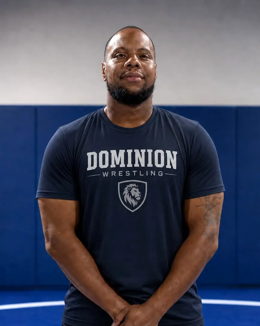 Coach Jodie Shavers in a Dominion Wrestling shirt