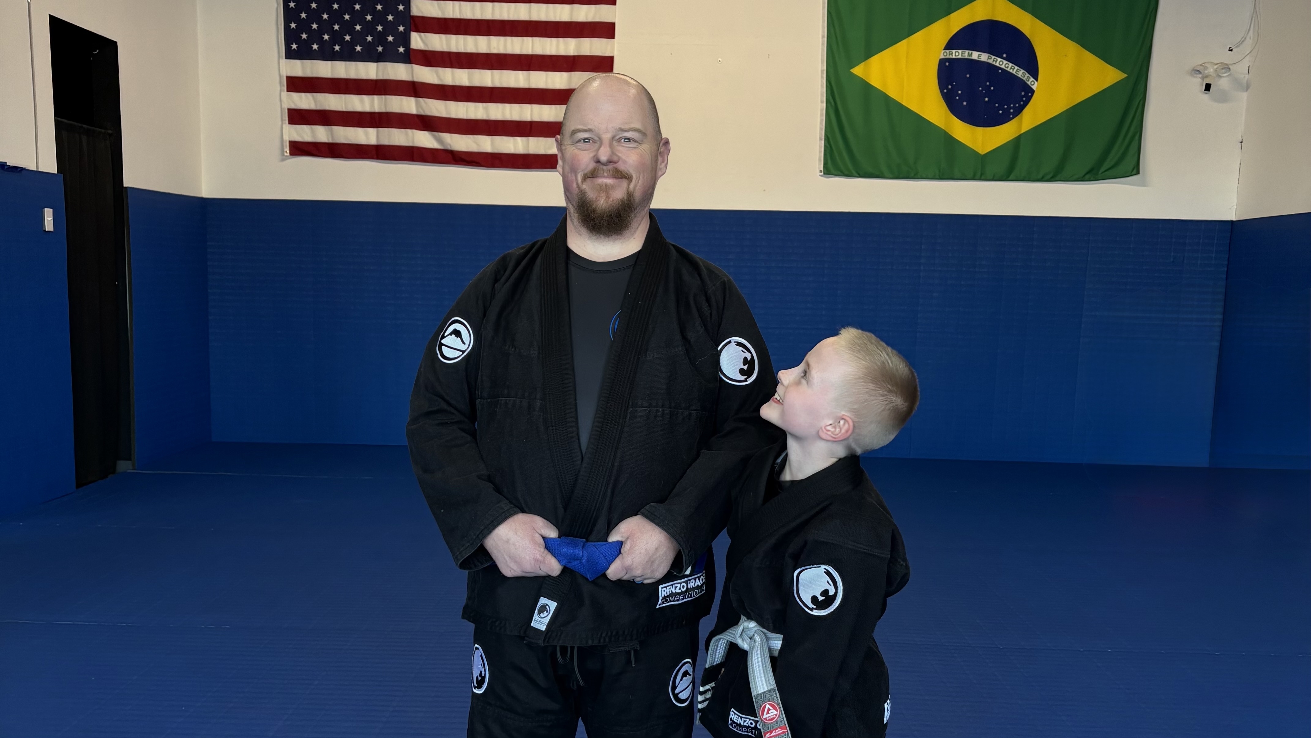 father and son at jiu jitsu