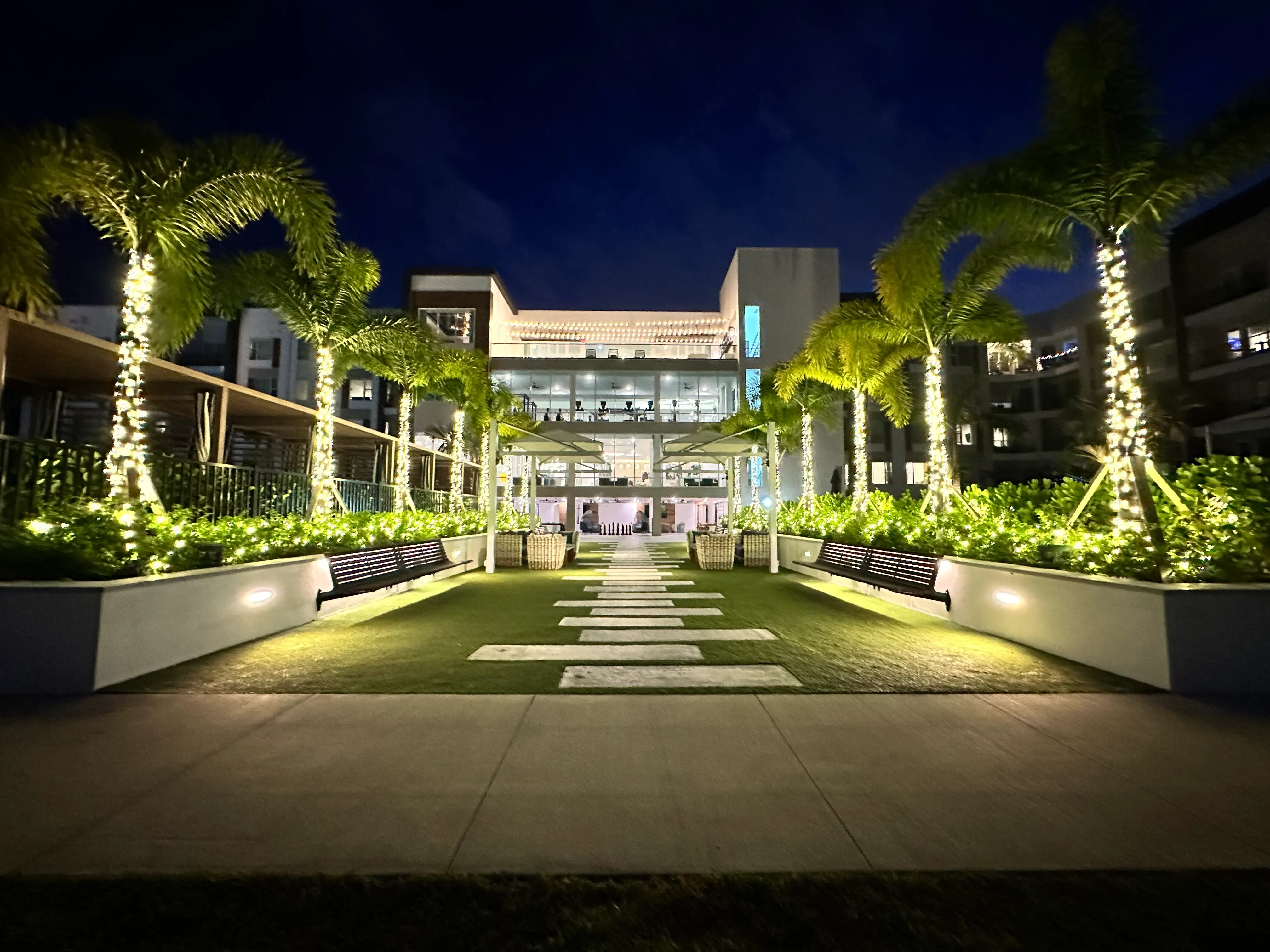 Commercial property exterior transformed with professional holiday lighting
