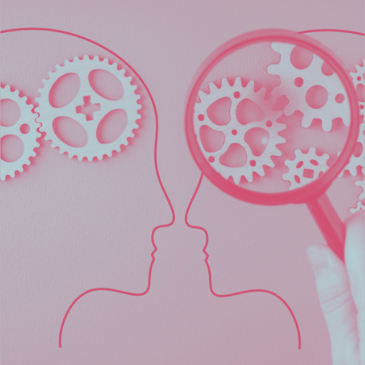 Two head outlines with gears and a magnifying glass