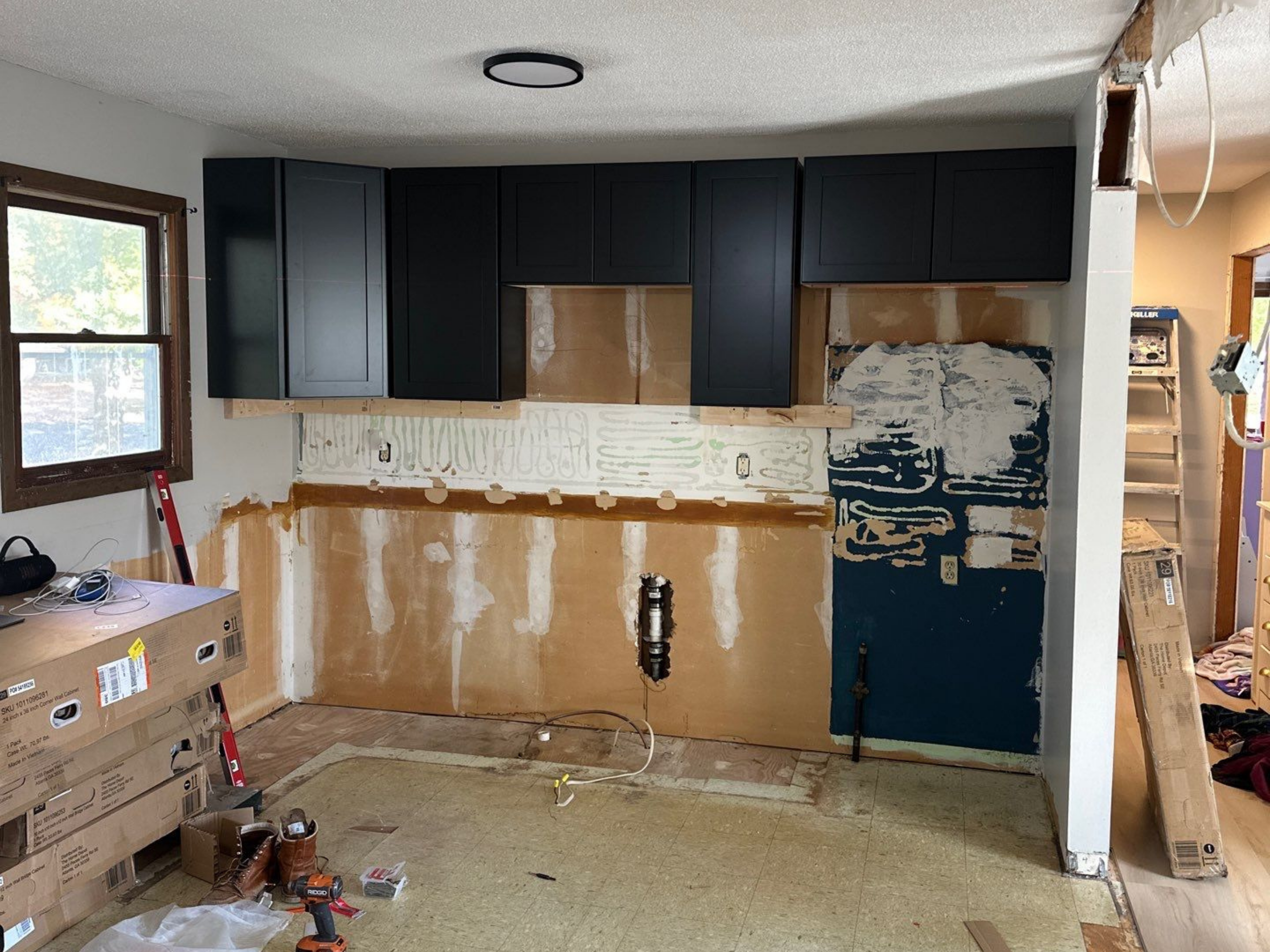 Before renovation - dark and dated living room