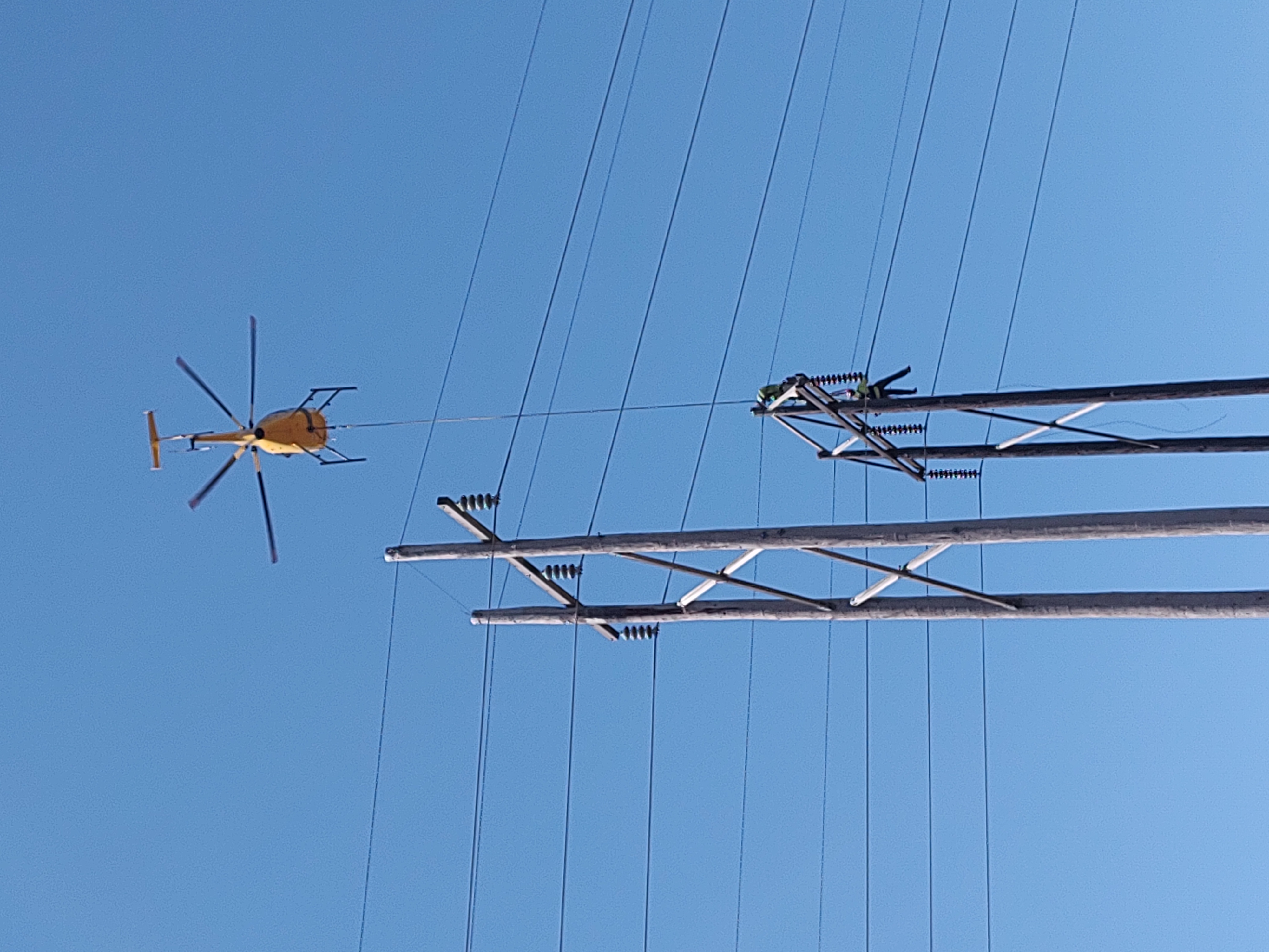 ARC helicopter powerline patrol near transmission towers