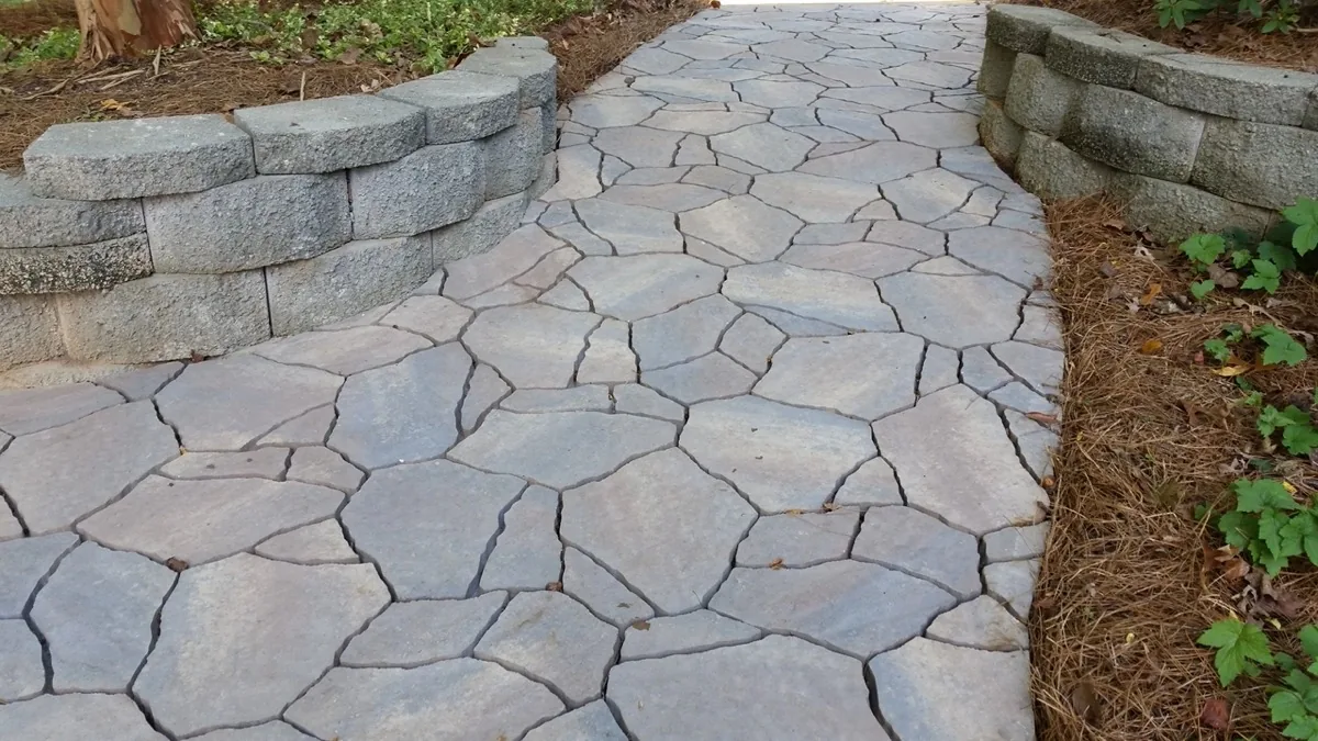 Finished landscape archway through mature plantings — LAP Landscaping work