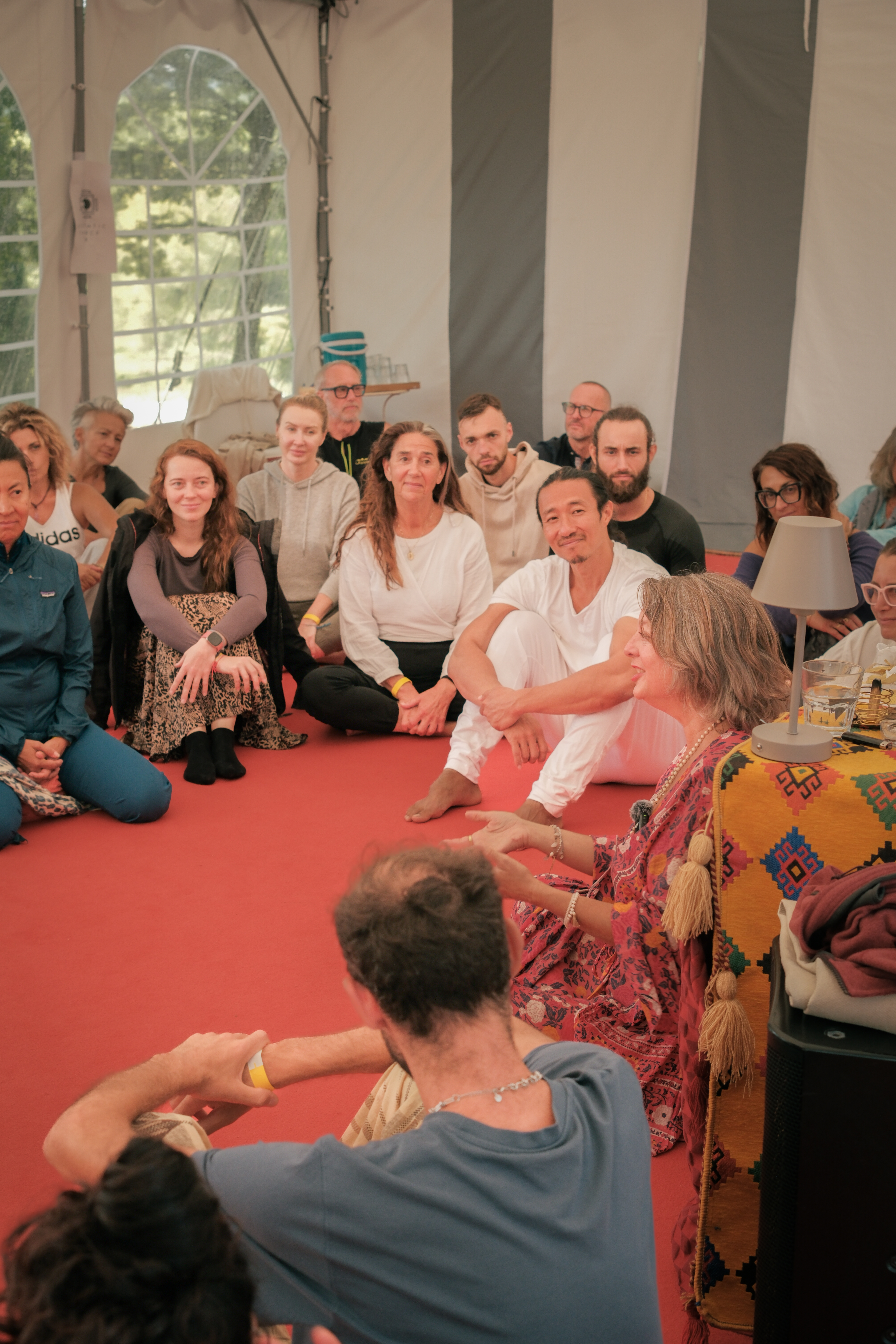 A participant in a quiet moment of reflection during breathwork