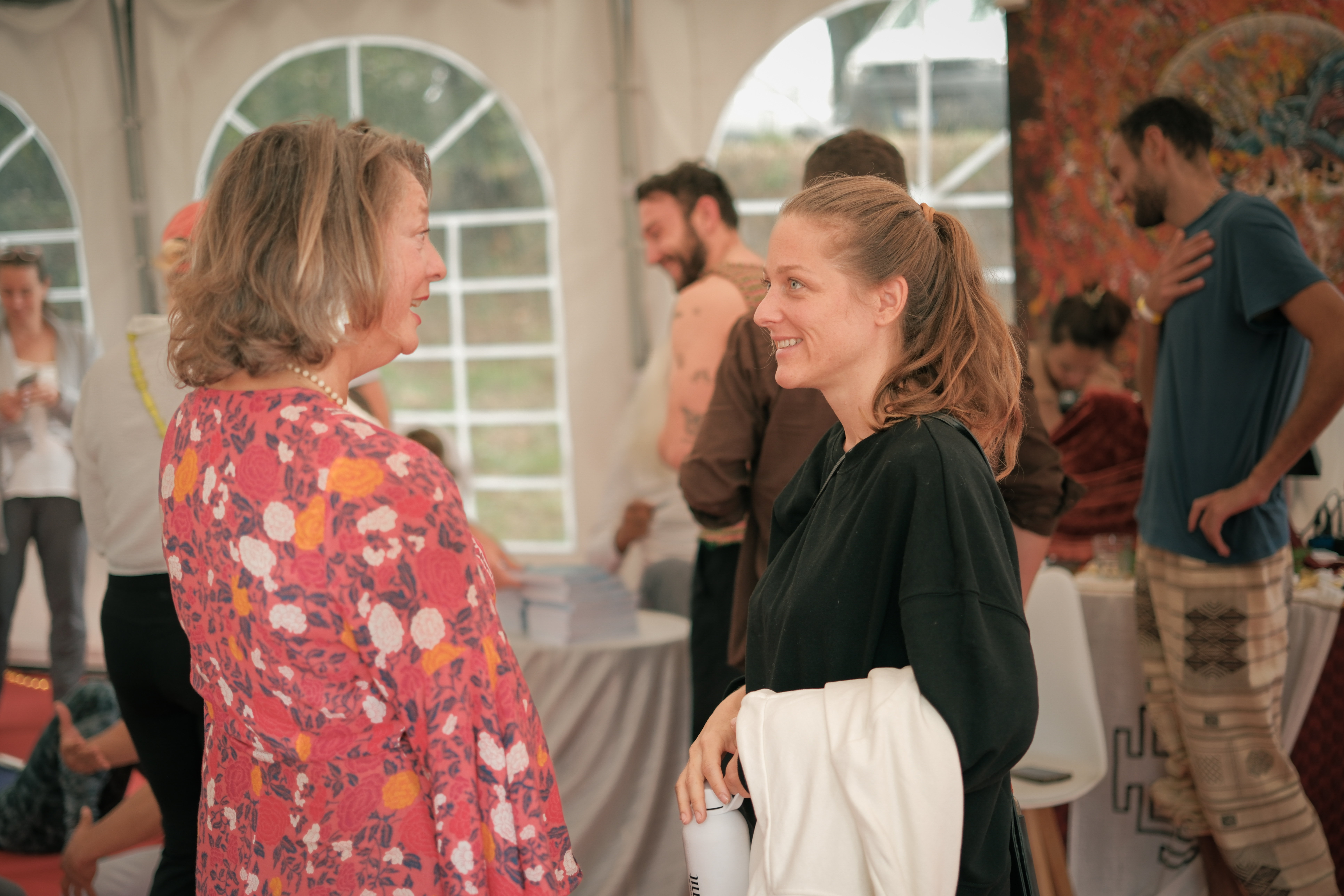 Facilitators connecting at an Alchemy of Breath gathering