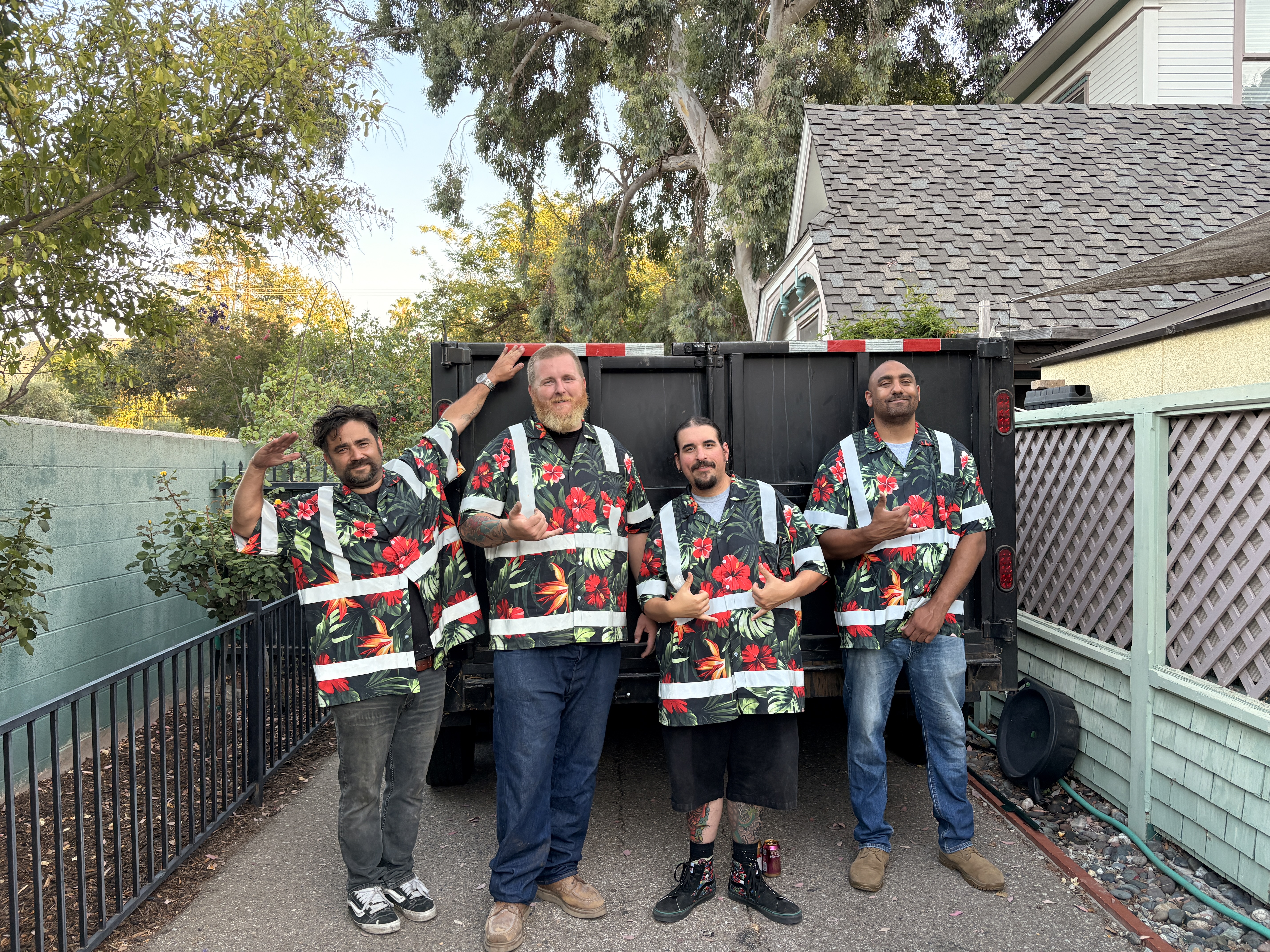 Aloha Hauling friendly professional team crew in Hawaiian shirts