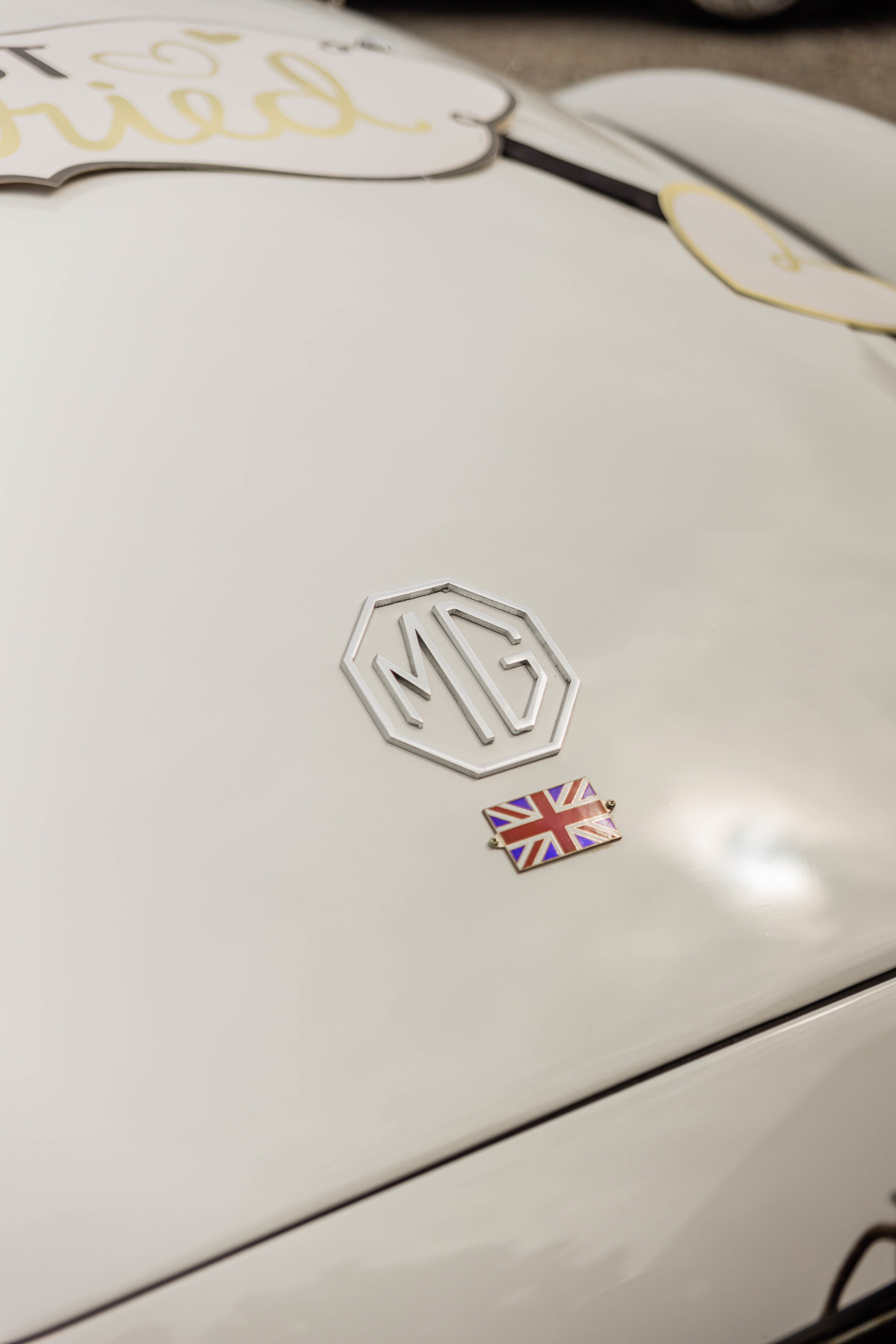 The MG badge and Union Jack on the Getaway Car