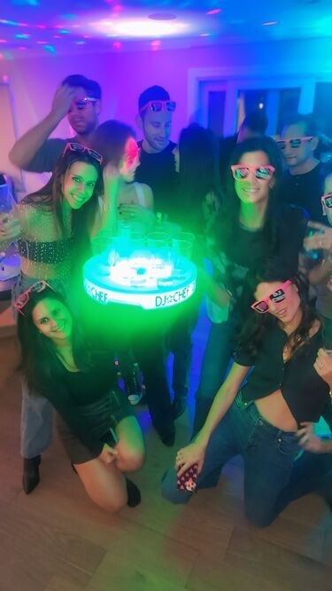 Birthday guests celebrating with DJ CHEF