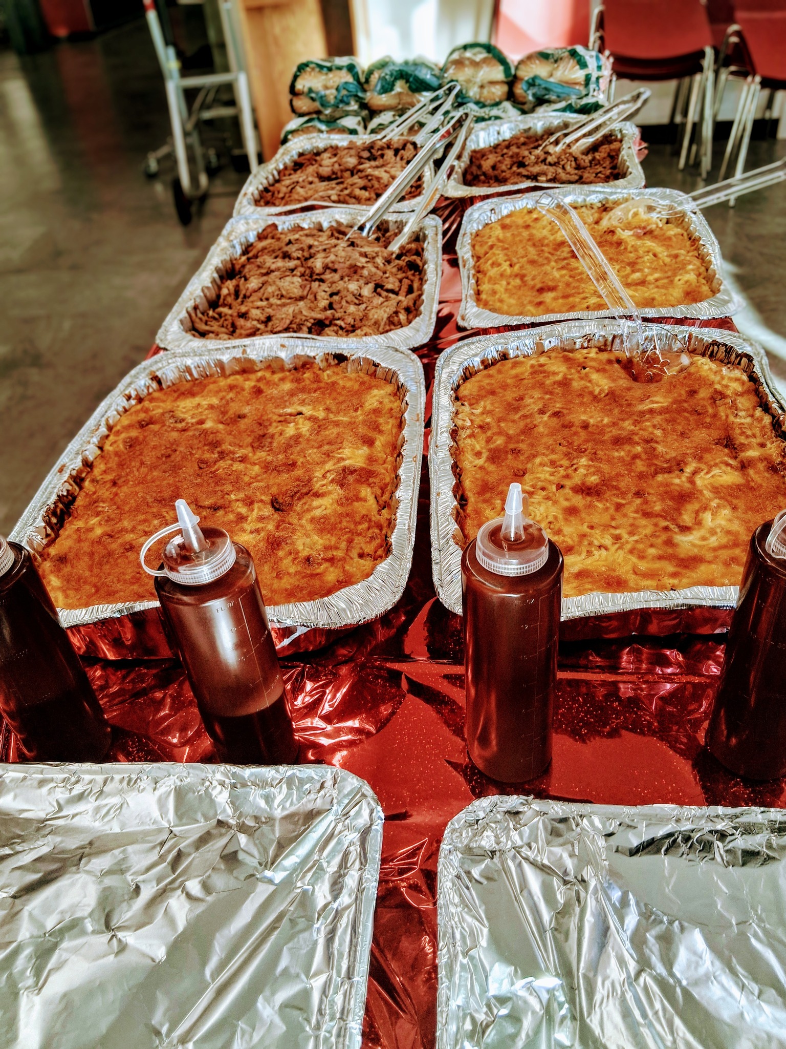 Mobile BBQ pit catering cooking outdoors in Lawrence Kansas