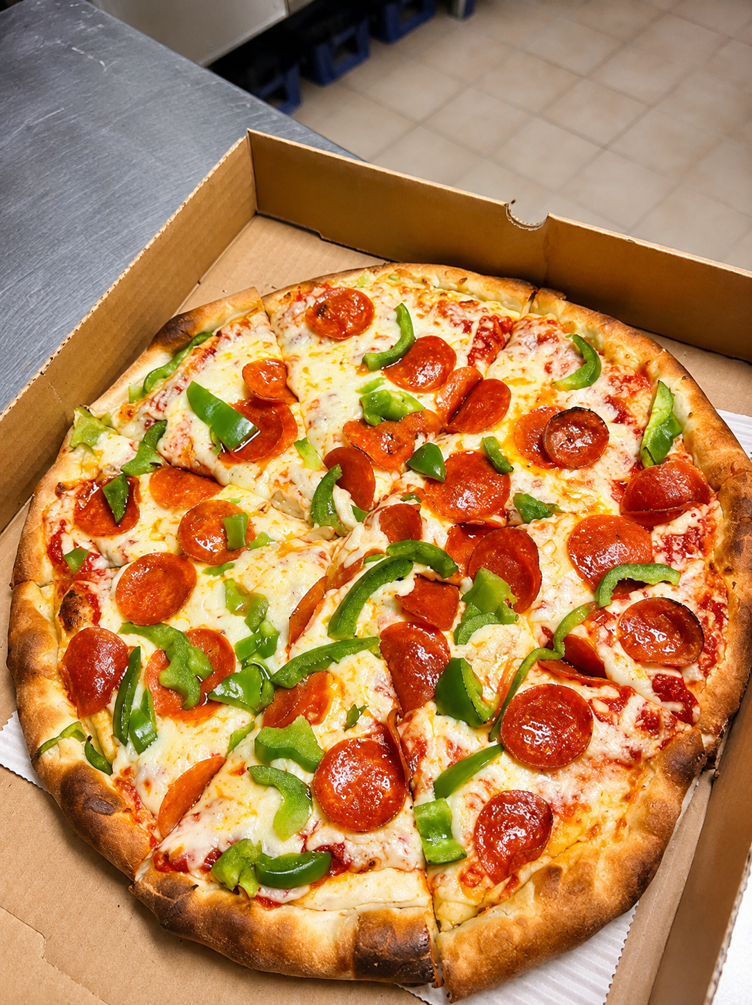 Large New York style pizza slice from Fronte Pizza