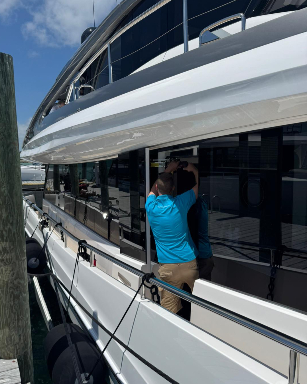 Aquamare specialists carrying out technical work onboard