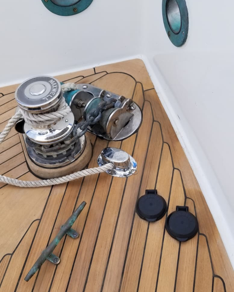 Re-caulked seams between teak planks